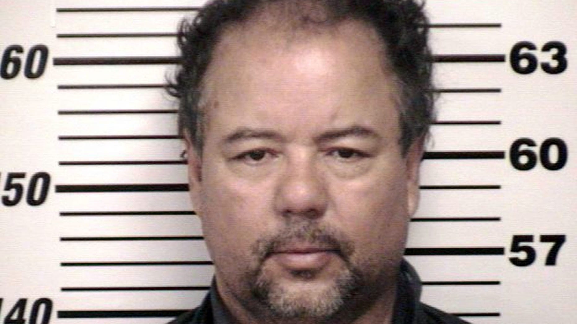 This image provided by the Cuyahoga County Sheriff's office shows the Cuyahoga County Corrections Center booking photo of Ariel Castro, 52, after he was ordered to be held on $8 million bail Thursday, May 9, 2013, in Cleveland. Castro, a former school bus driver, is accused of imprisoning three young women and beating them repeatedly over a decade in Cleveland. (AP Photo/Cuyahoga County)