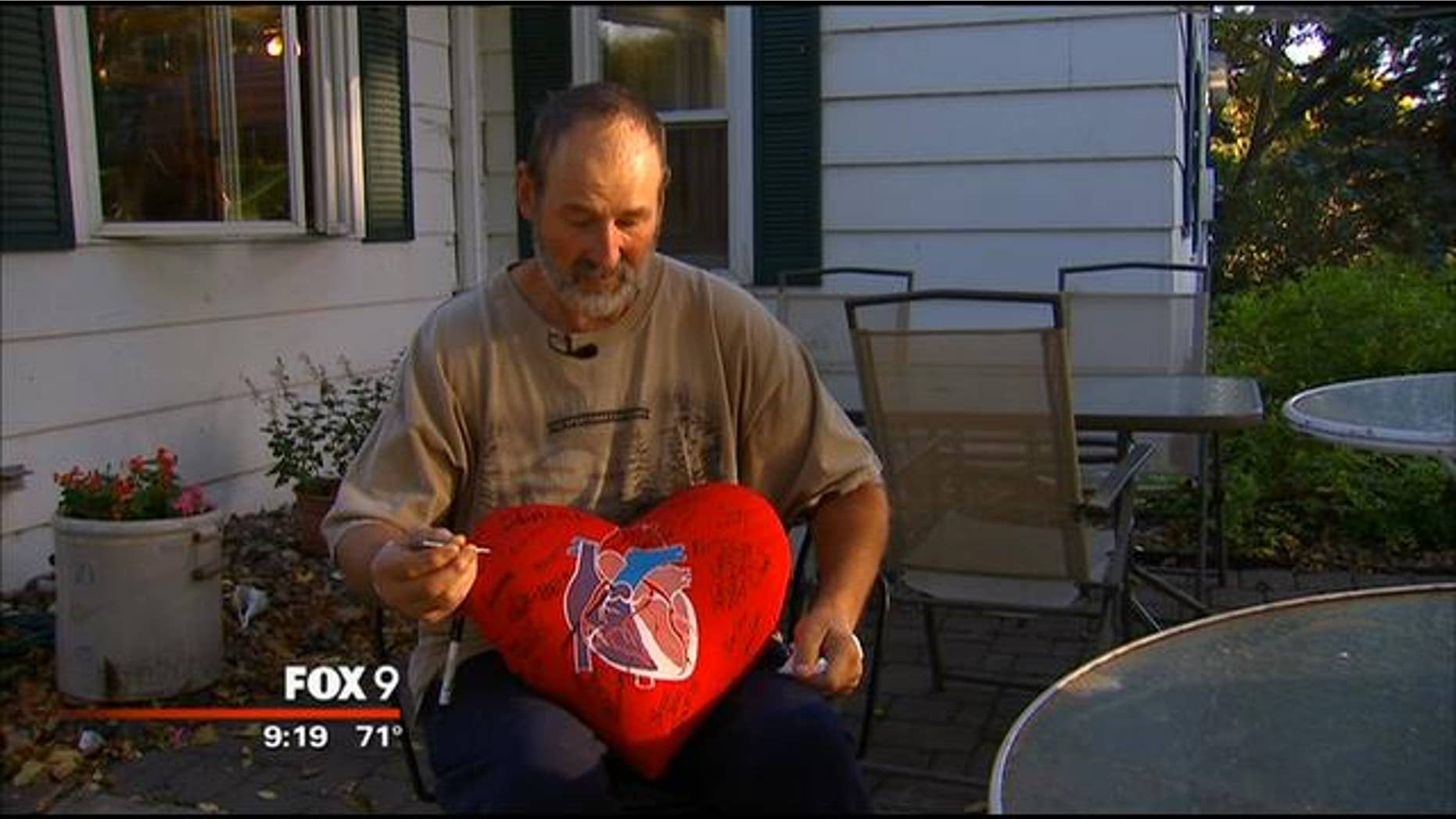 Euguene Rakow indicates precisely where he shot himself in the heart with a nail gun last week at his home in Minnesota. (MyFoxTwinCities.com)