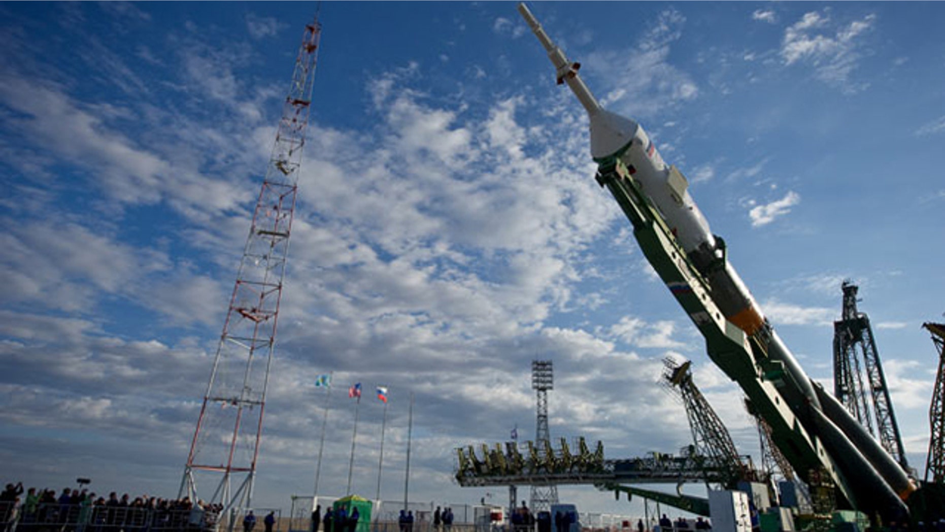 The Soyuz TMA-01M spacecraft is raised into vertical position at the launch pad of the Baikonur Cosmodrome, Kazakhstan ahead of its planned launch on Oct. 7, 2010 at 7:10 p.m. ET.