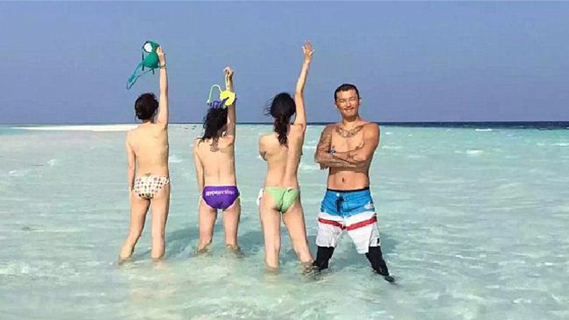 Backpacker strip down in Malaysia.