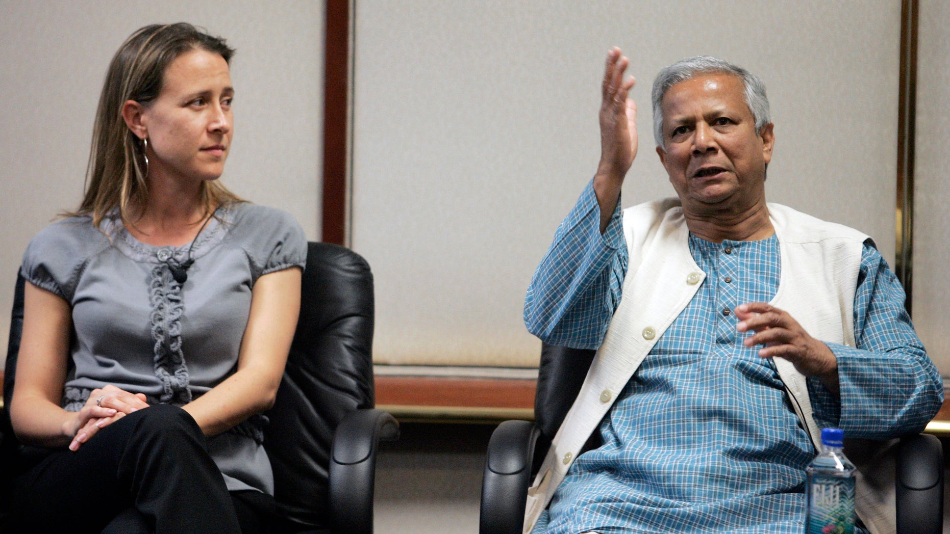 Panelists Anne Wojcicki, co-founder of 23and Me Inc. and 2006 Nobel Peace Prize Laureate Muhammad Yunus (R), a panel at the Global Overview panel at 2008 Milken Institute Global Conference in Beverly Hills California April 28, 2008. (REUTERS/Fred Prouser)