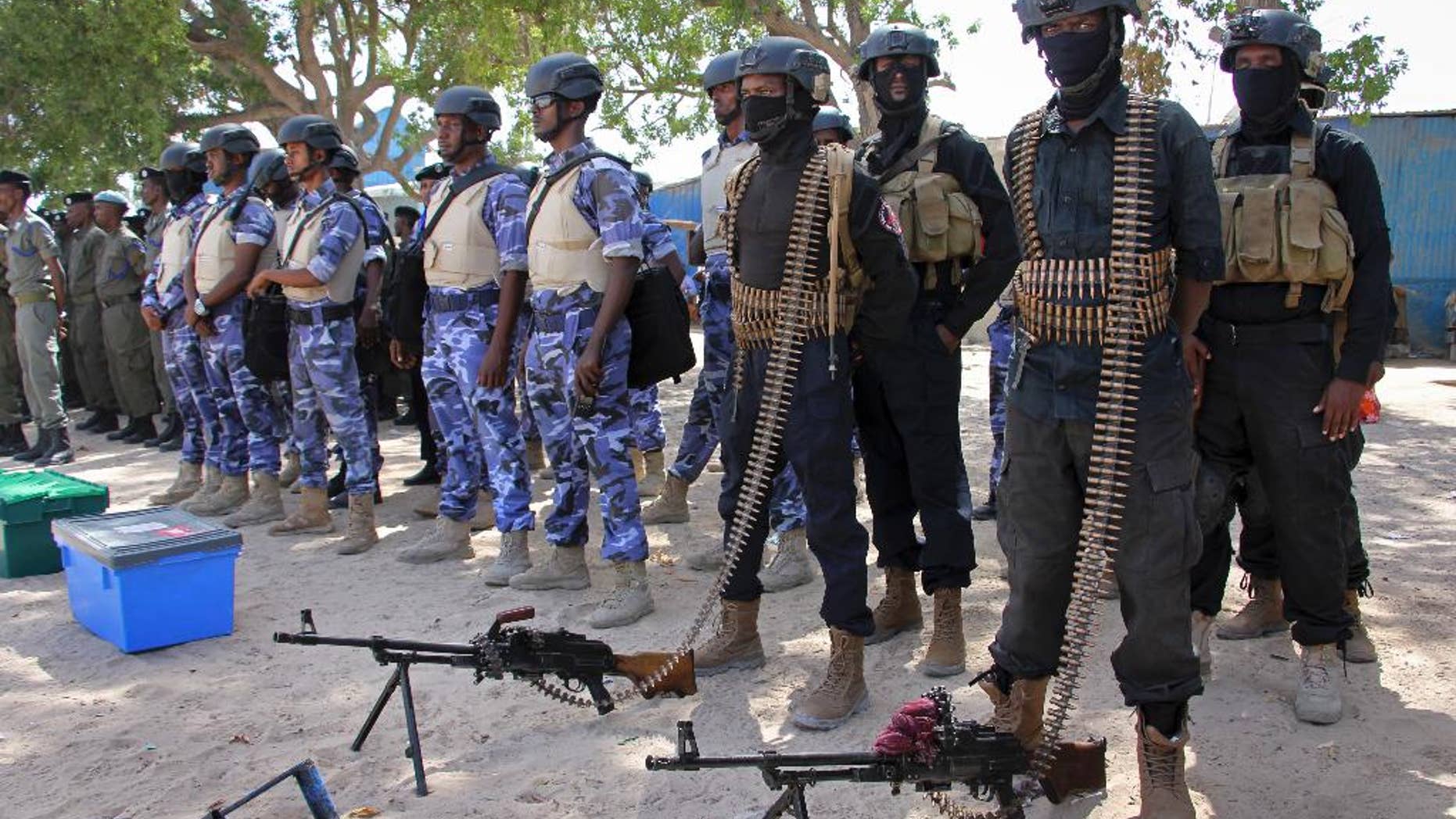 Somali soldiers prepare to secure the capital on the eve of presidential elections, at a police academy in Mogadishu.
