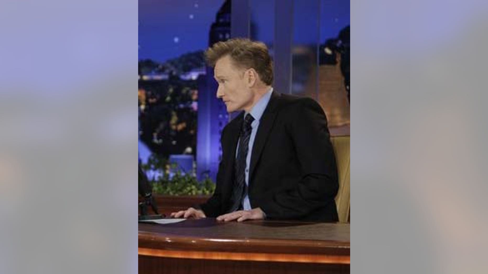 Host Conan O'Brien (R) and actor Will Ferrell are seen during a taping of "The Tonight Show" in Burbank, California June 1, 2009. O'Brien on Monday took over from Jay Leno as the show's host. REUTERS/Paul Drinkwater/NBA Photo/Handout (UNITED STATES ENTERTAINMENT) NO SALES. NO ARCHIVES. FOR EDITORIAL USE ONLY. NOT FOR SALE FOR MARKETING OR ADVERTISING CAMPAIGNS
