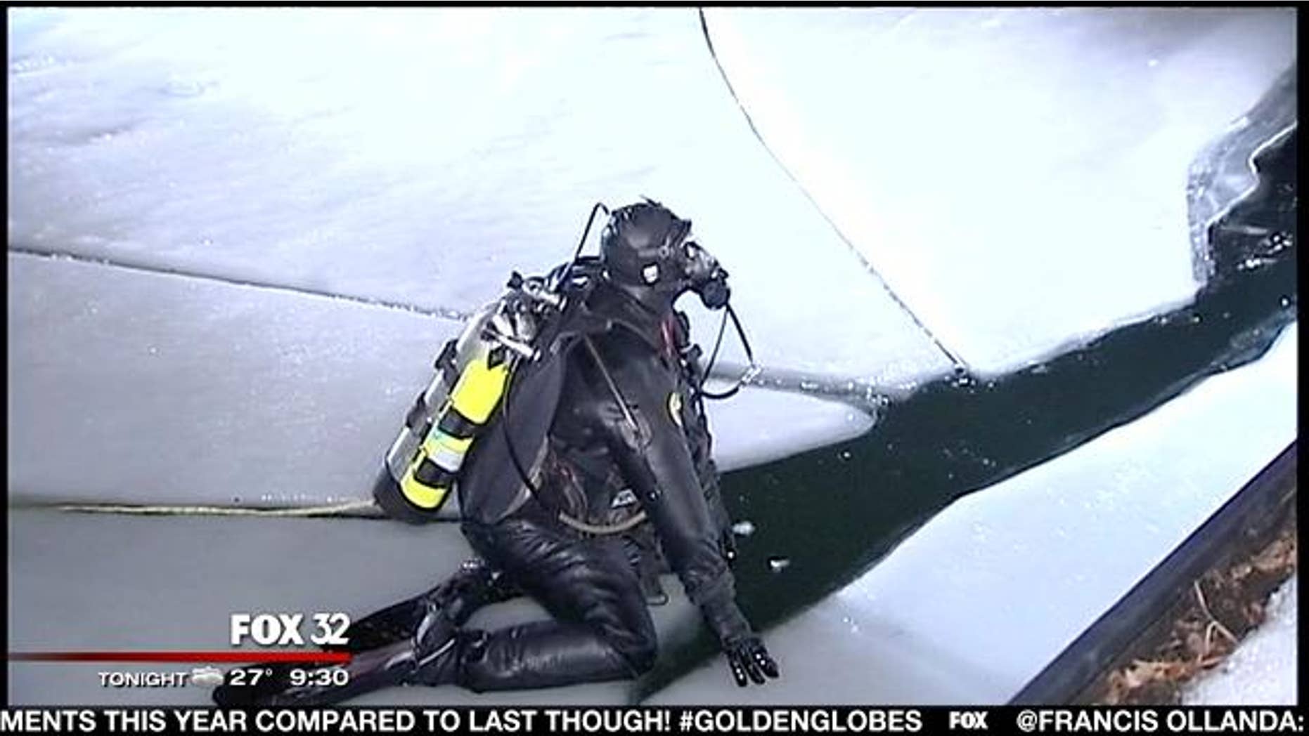 January 13, 2014: A diver prepares to search the Chicago River for a missing woman who fell in to the river while trying to help a friend early Monday. (MyFoxChicago.com)