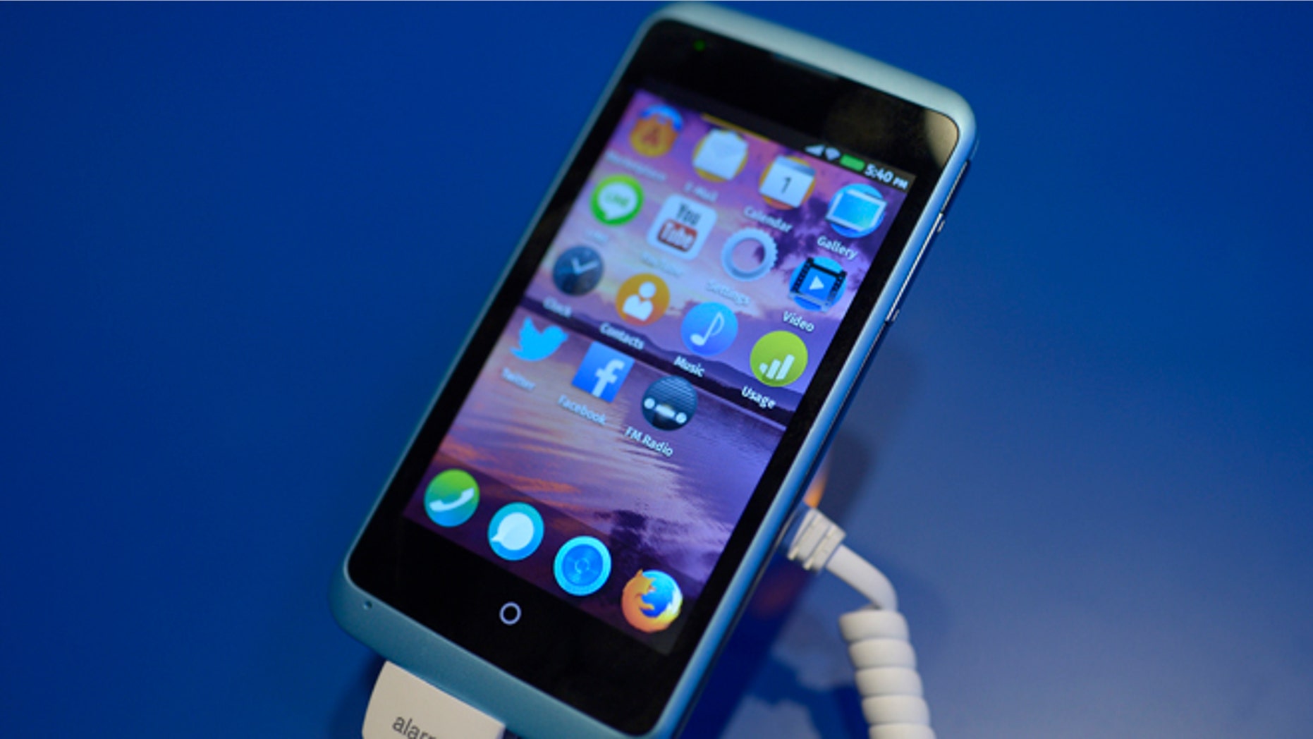 A device is running with Firefox OS software during the Mobile World Congress, the world's largest mobile phone trade show in Barcelona, Spain, Sunday, Feb. 23, 2014. Expected highlights include major product launches from Samsung and other phone makers, along with a keynote address by Facebook founder and chief executive Mark Zuckerberg. (AP Photo/Manu Fernandez)
