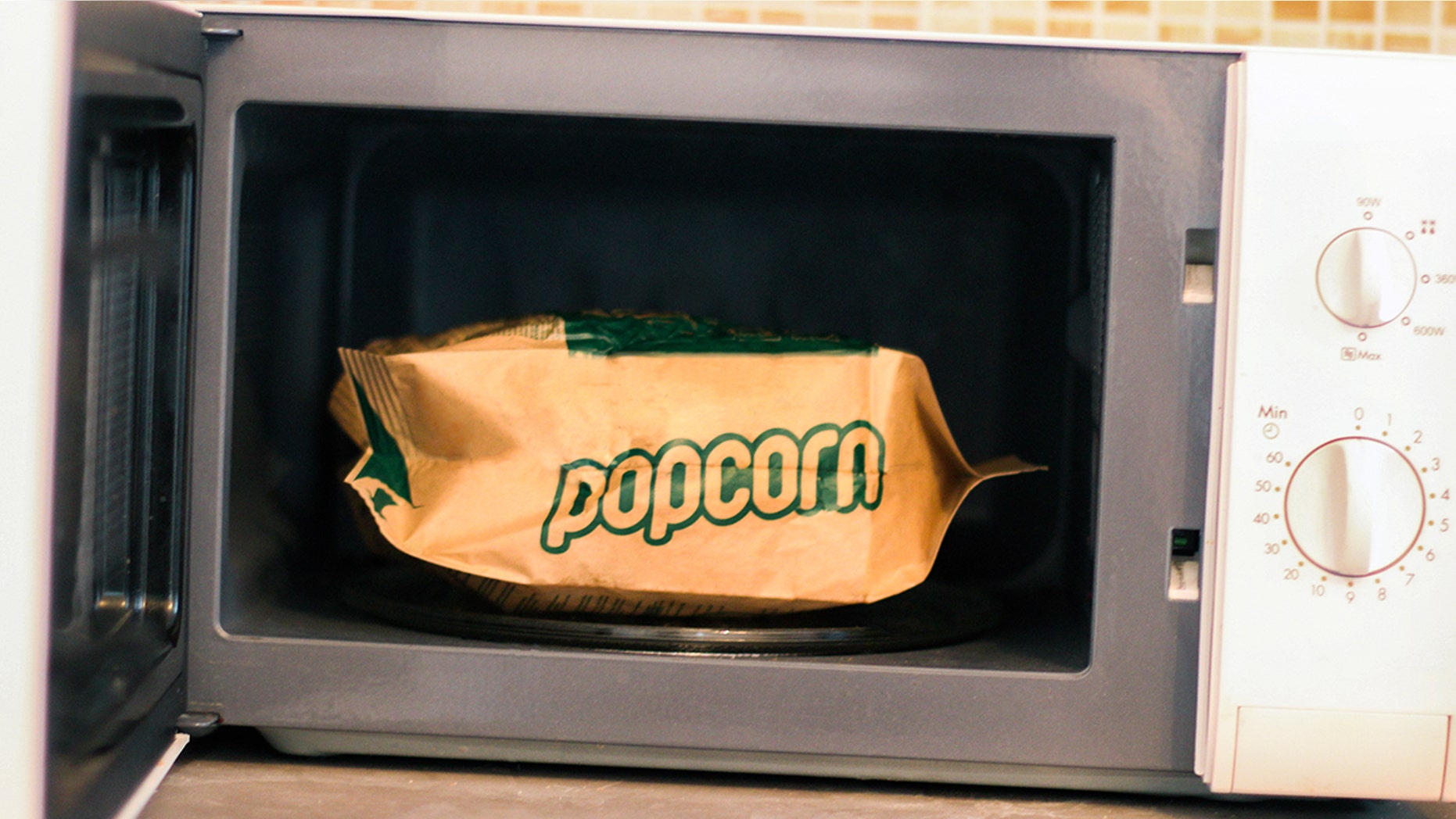 Good news! Popcorn won't actually explode if you don't microwave it "this side up."