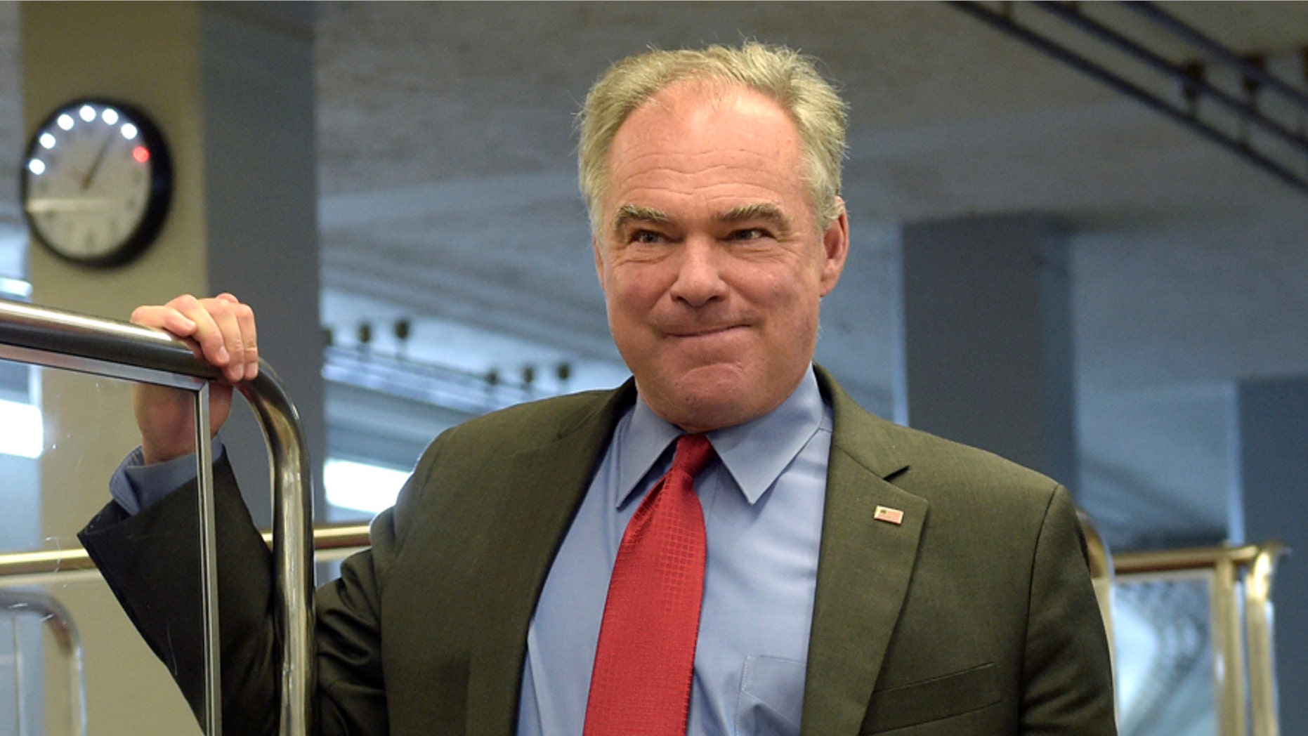 Sen. Tim Kaine, D-Va., gets off of the Senate subway as he heads to a luncheon with Democrats on Capitol Hill in Washington, Tuesday, Sept. 12, 2017. (AP Photo/Susan Walsh)
