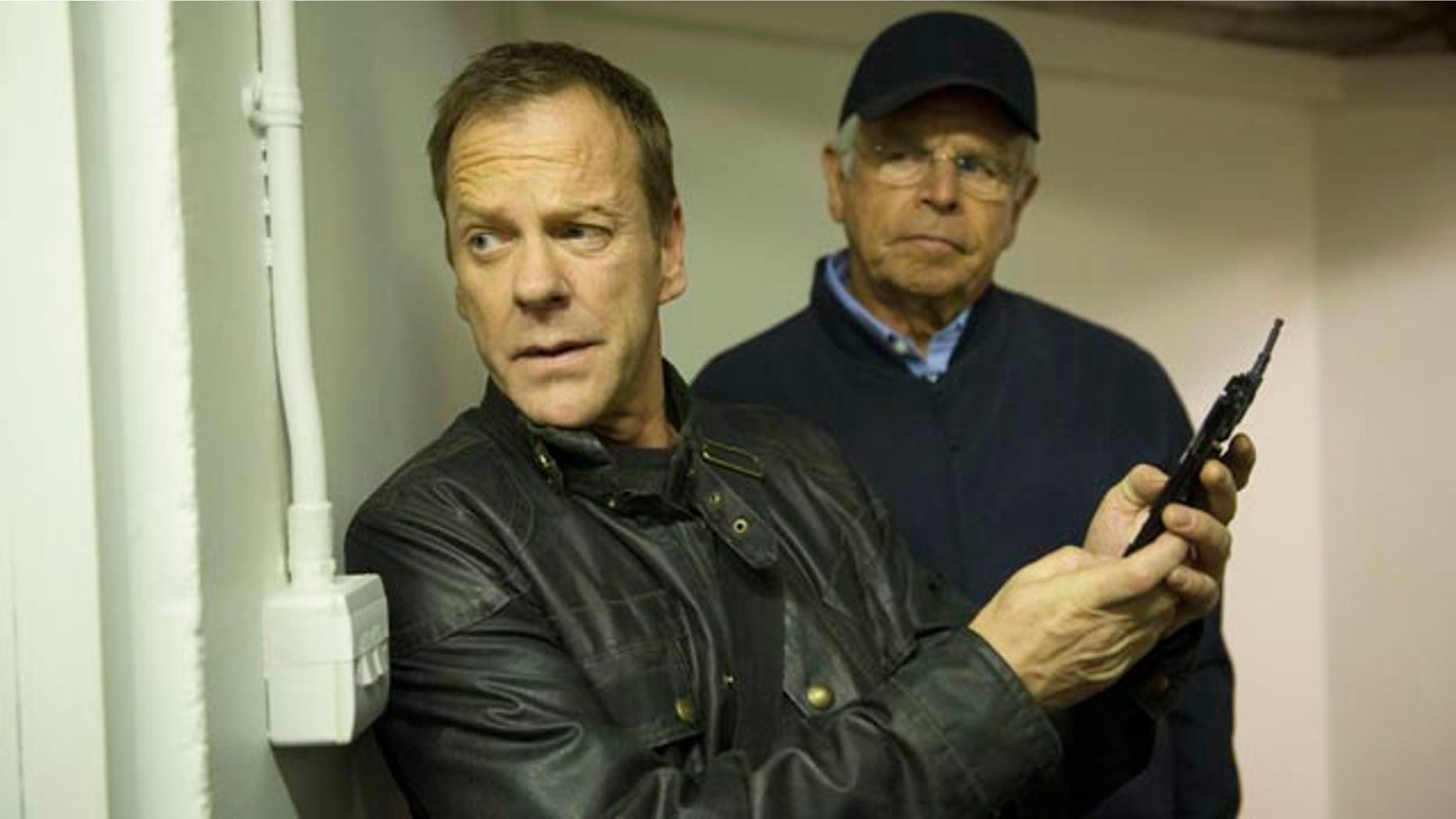 Jack Bauer (Kiefer Sutherland, left) moves President Heller (William Devane) from the Presidential residence in '24: LIVE ANOTHER DAY' (Daniel Smith/FOX)