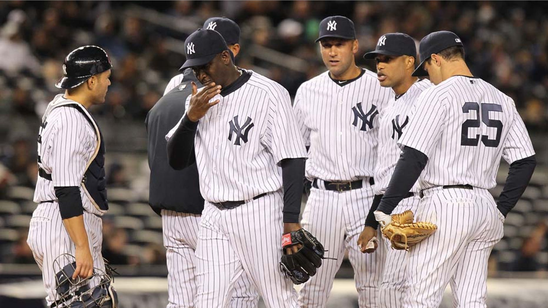 NEW YORK, NY - APRIL 05: Rafael Soriano #29 of the New York Yankees is pulled from the game in the eighth inning after loading the bases against the Minnesota Twins at Yankee Stadium on April 5, 2011 in the Bronx borough of New York City. (Photo by Nick Laham/Getty Images)