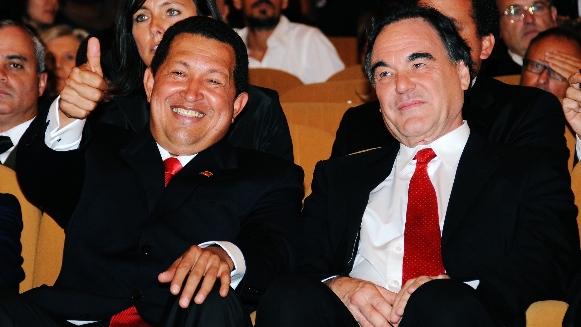 VENICE, ITALY - SEPTEMBER 07: Venezuela's President Hugo Chavez and director Oliver Stone attends the "South Of The Border" premiere at the Sala Grande during the 66th Venice Film Festival on September 7, 2009 in Venice, Italy. (Photo by Francois Durand/Getty Images)