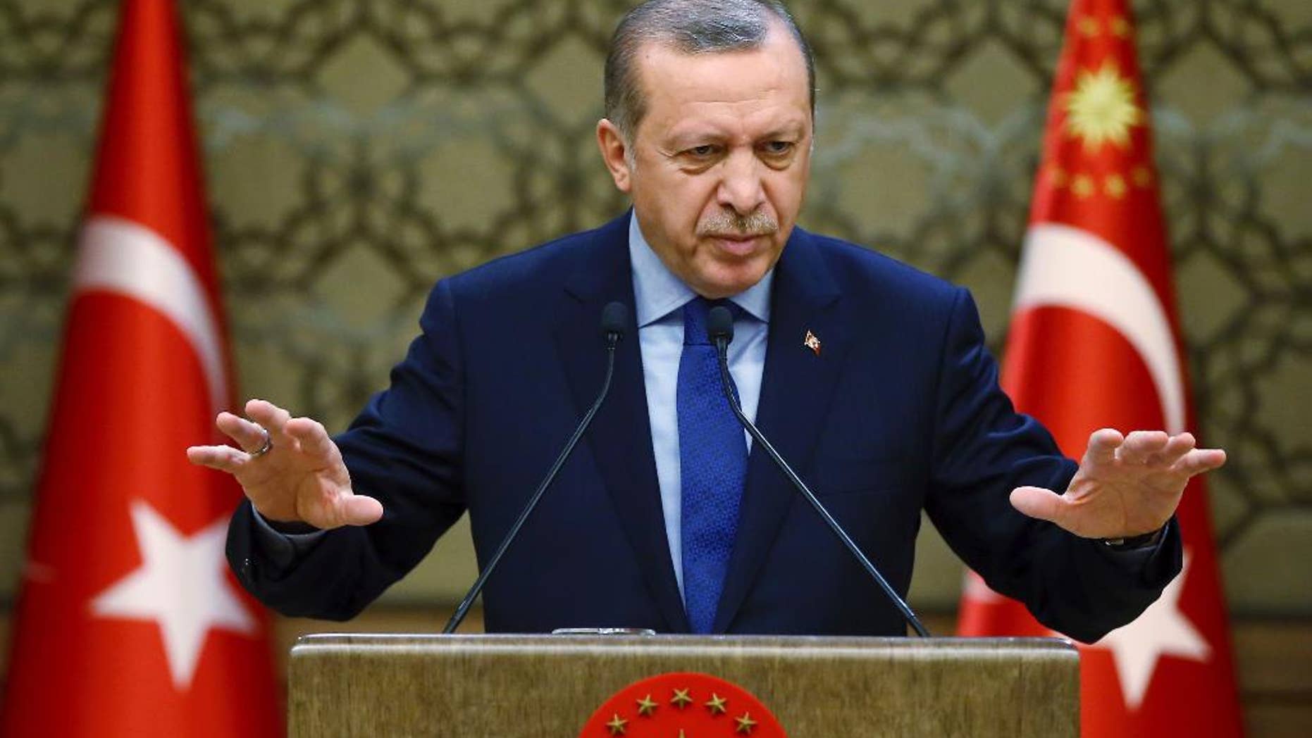 Turkey's President Recep Tayyip Erdogan addresses local administrators in Ankara, Turkey, Wednesday, Dec. 7, 2016. (Kayhan Ozer, Presidential Press Service, Pool photo via AP)