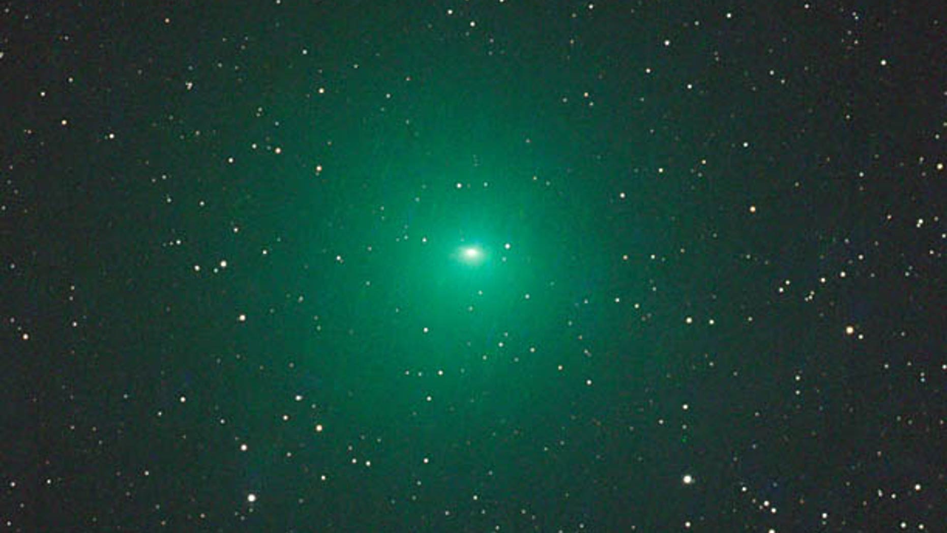 Comet 252P/LINEAR glows a vivid green from fluorescing gas in this composite photo taken from Namibia on March 18, 2016, with a specialized telescope 12 inches in aperture. (Gerald Rhemann / www.astrostudio.at - See more at: http://www.skyandtelescope.com/press-releases/how-to-spot-comet-252p-linear/#sthash.GgGlriwX.dpuf)