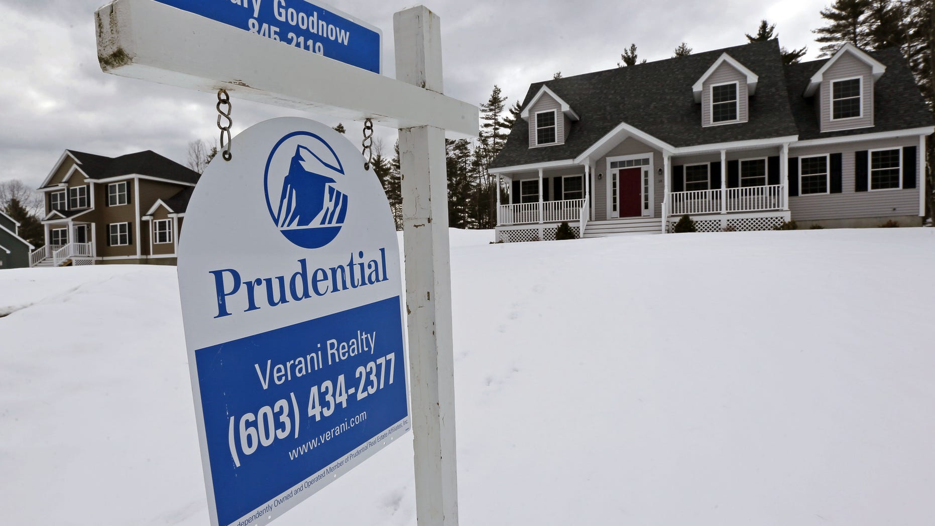 FILE - In this March 5, 2013 file photo, a home is for sale in Auburn, N.H. Standard & Poor's/Case-Shiller reports on home prices in December on Tuesday, Feb. 25, 2014. (AP Photo/Charles Krupa, File)