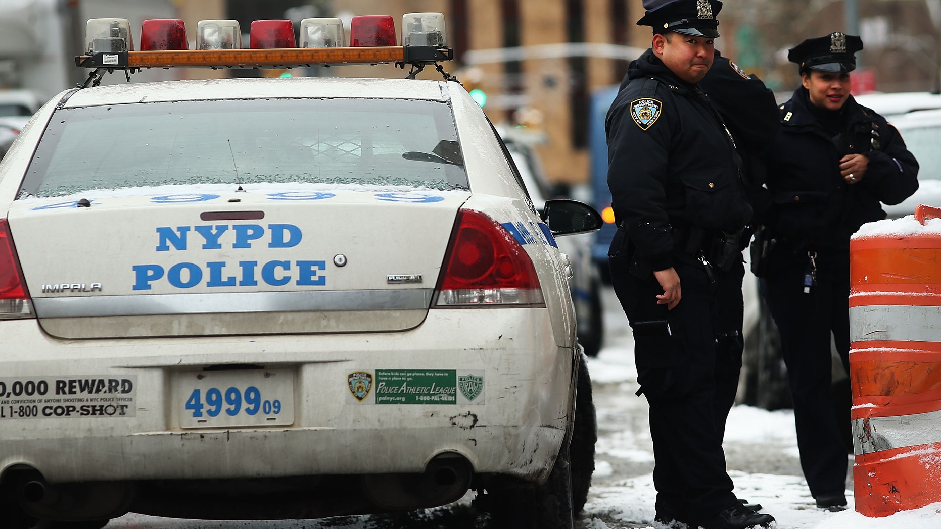 NEW YORK, NY - JANUARY 09: Police patrol outside of a Manhattan court house for the sentencing of convicted terrorist Mustafa Kamel Mustafa on January 9, 2015 in New York City. Mustafa, a 56 year old British cleric, faces a likely life sentence after his May conviction for charges in plots to kidnap tourists in Yemen in 1998 and to construct a terrorist training camp in Oregon. (Photo by Spencer Platt/Getty Images).