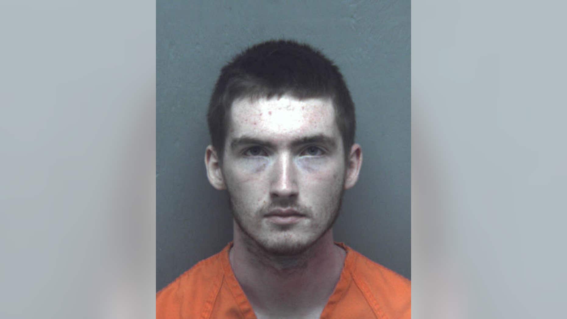 This photo provided by the Christiansburg Police Department shows Neil Allan MacInnis, of Christiansburg, Va. MacInnis is charged with two counts each of malicious wounding and using a firearm in the commission of a felony stemming from the shooting at the satellite campus of New River Community College at New River Valley Mall, Christiansburg Police Chief Mark Sisson said at news conference on Friday, April 12, 2013. He was being held without bond at the Montgomery County Jail. (AP Photo/Christiansburg Police Department)
