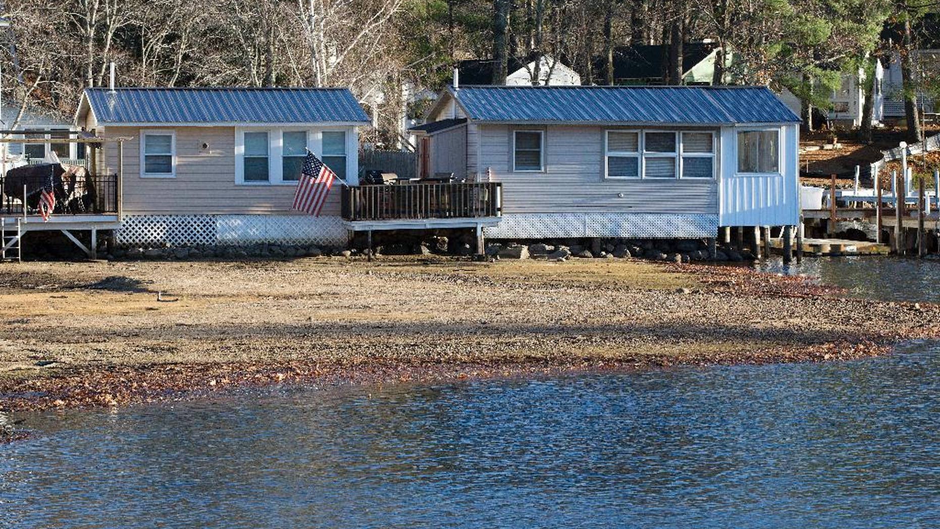 Waterfront cabins are seen on Lake Winnipesaukee Thursday, Nov. 17, 2016, in Laconia, N.H. The long-running drought in much of the Northeastern United States is expected to persist through the winter. The U.S. Drought Monitor map released Thursday shows dry conditions continuing through February throughout New England. (AP Photo/Jim Cole)