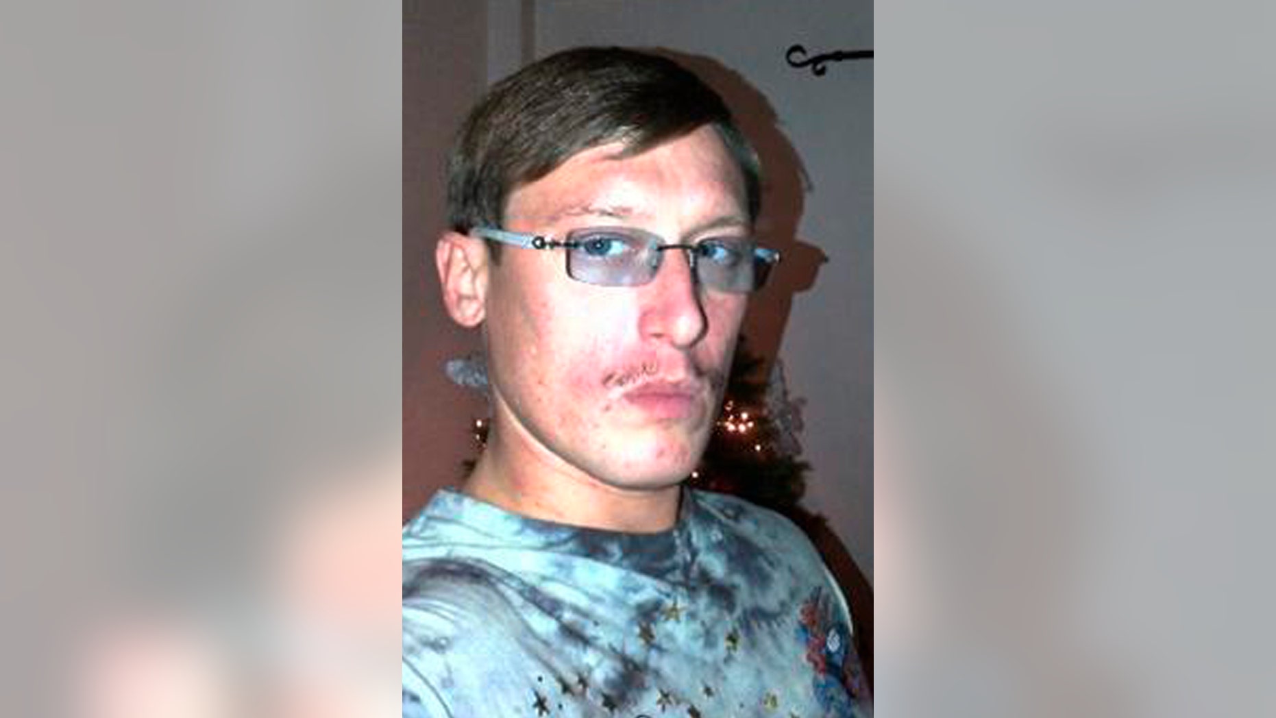 In this photo released Sunday May 12, 2013, by the British Serious Organised Crime Agency (SOCA), showing British fugitive Andrew Moran in this undated photo. Spain's Interior Ministry officials say Spanish police arrested Moran on Friday May 10, as he relaxed next to the pool of a luxury villa in Alicante, Spain. Moran has been on the run since 2009 when he assaulted four security guards, vaulted over the court dock during his trial and escaped, and was listed among the most wanted British fugitives on the loose in Spain. (AP Photo/SOCA)