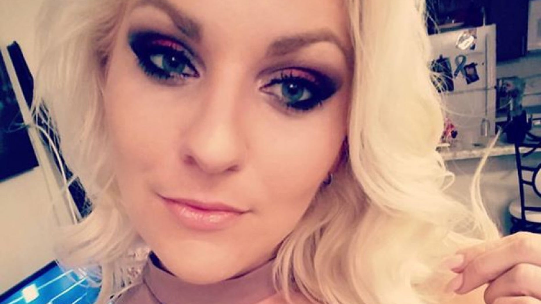 Kelli Russell, 33, was arrested for allegedly stealing packages in a Dallas neighborhood.