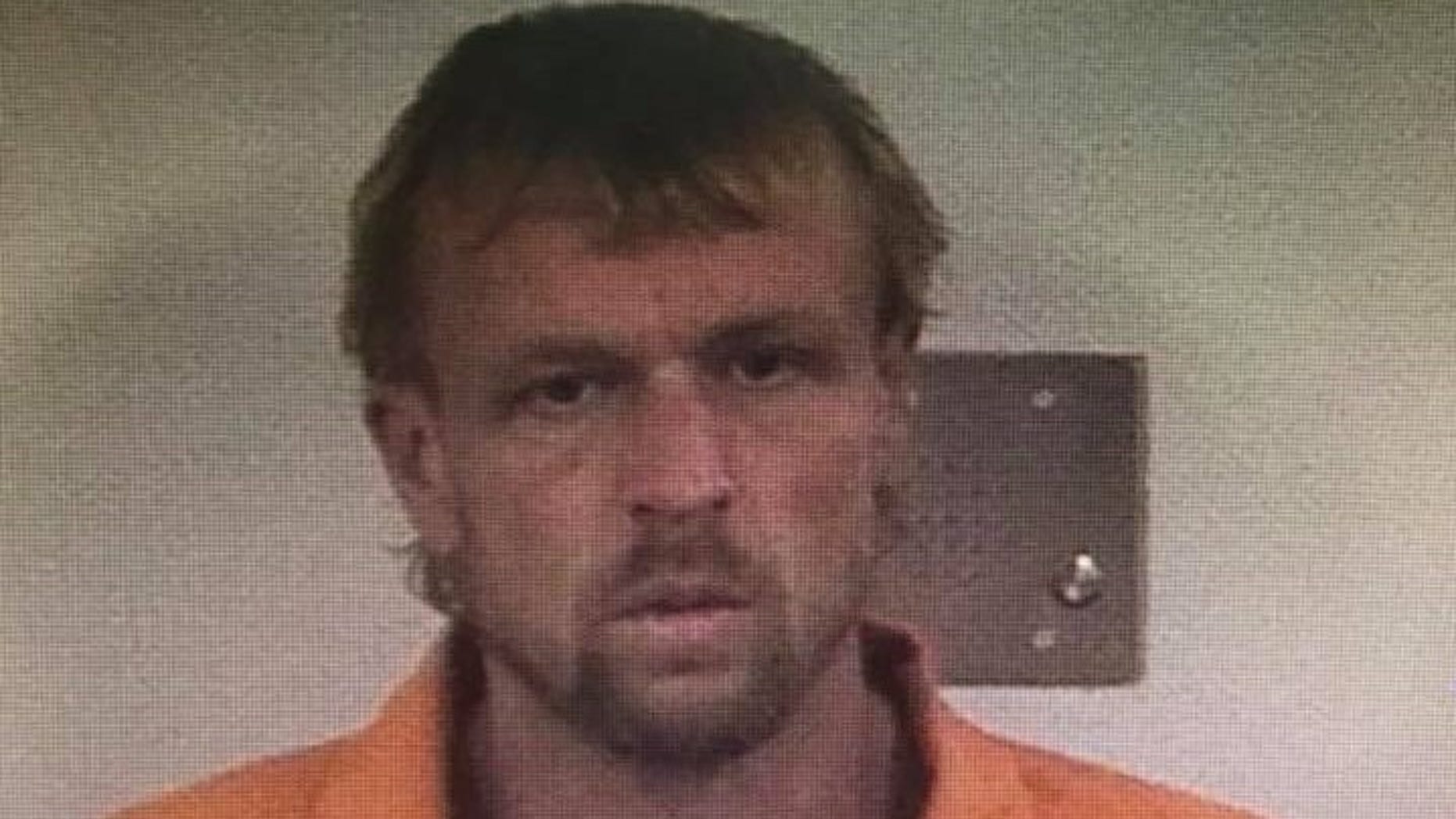Christopher Nicholas Carroll, 5-foot-9 and 165 pounds, escaped from a Georgia jail.