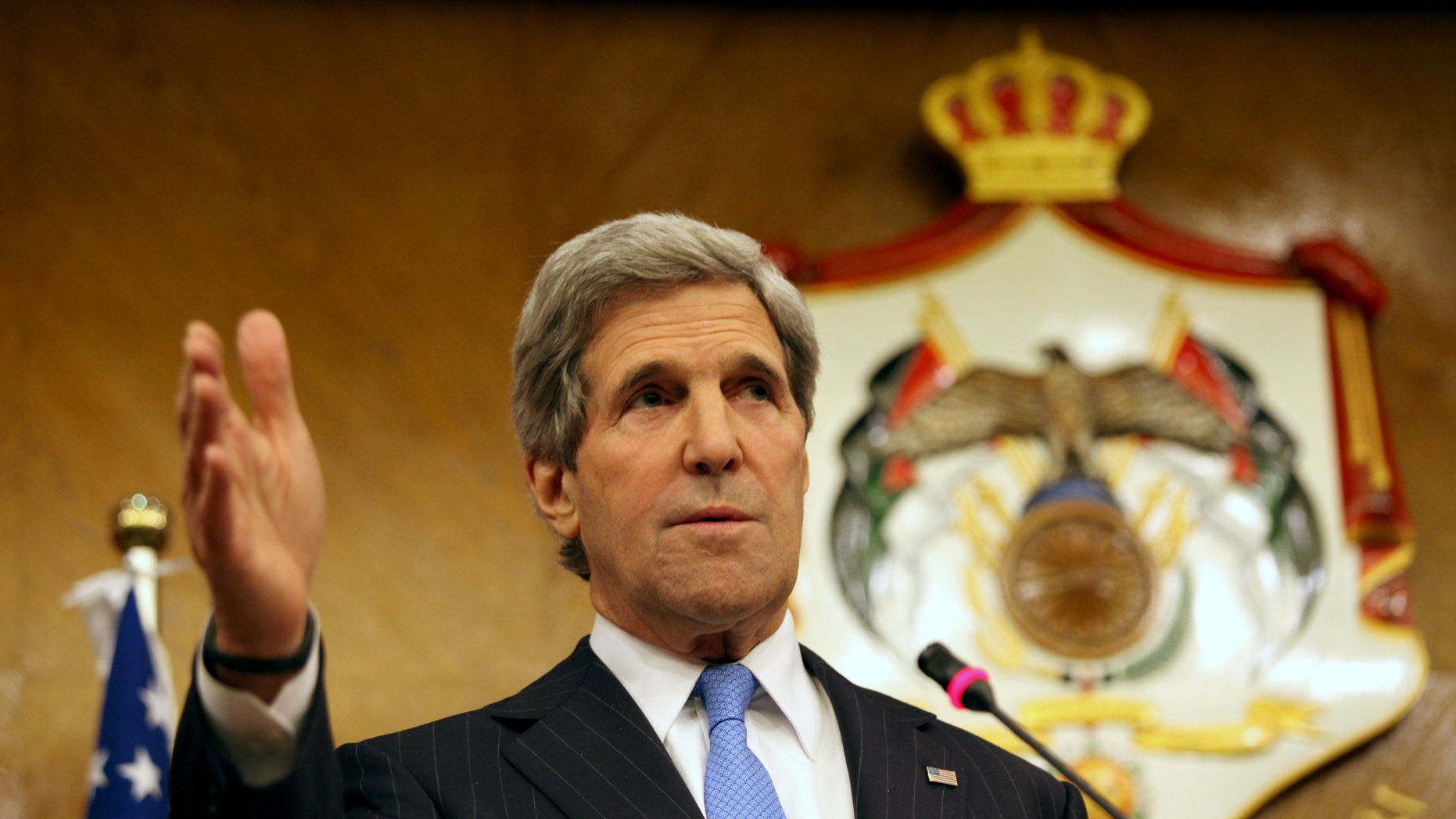 U.S. Secretary of State John Kerry speaks during a joint news conference with his Jordanian counterpart, Nasser Judeh, not pictured, in Amman Wednesday, May 22, 2013. Secretary of State John Kerry says the United States and its Arab and European allies will step up their support for Syria’s opposition to help them “fight for the freedom of their country” if President Bashar Assad’s regime doesn’t engage in peace talks in good faith. (AP Photo/Mohammad Hannon)