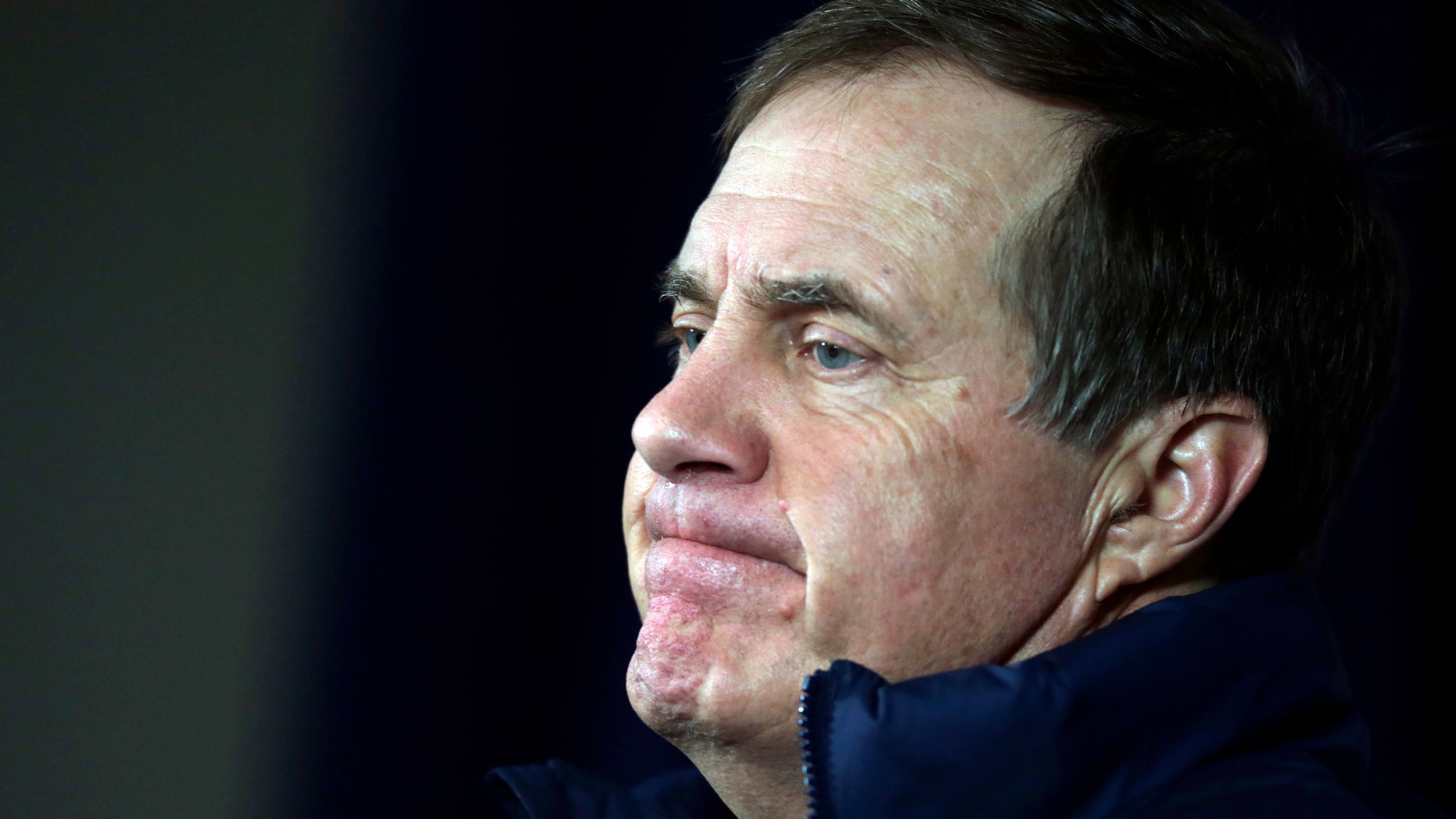 New England Patriots head coach Bill Belichick pauses during a news conference before NFL football practice in Foxborough, Mass., Wednesday, Jan. 2, 2013. The Patriots don't know who they'll face in their playoff opener. But, they do know plenty about that team. They are familiar with all three potential opponents, the Texans, Ravens and Colts, having played them already this season.(AP Photo/Charles Krupa)