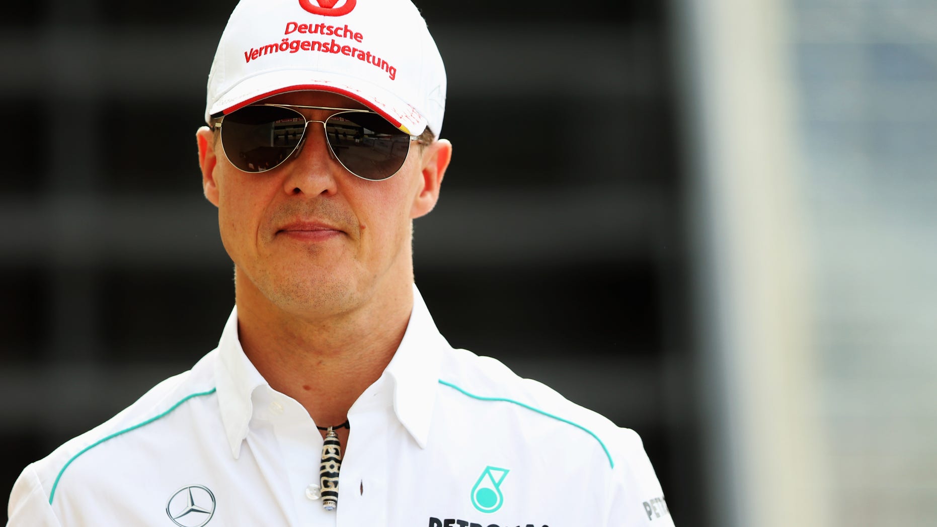 SAO PAULO, BRAZIL - NOVEMBER 23: Michael Schumacher of Germany and Mercedes GP walks in the paddock following practice for the Brazilian Formula One Grand Prix at the Autodromo Jose Carlos Pace on November 23, 2012 in Sao Paulo, Brazil. (Photo by Mark Thompson/Getty Images)