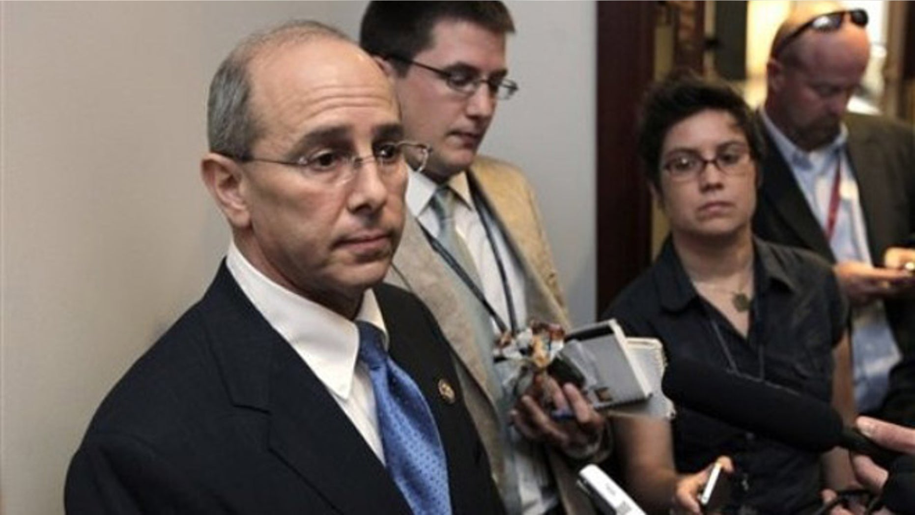 FILE: Rep. Charles Boustany, R-La., speaks with reporters after a closed-door meeting at the Capitol.