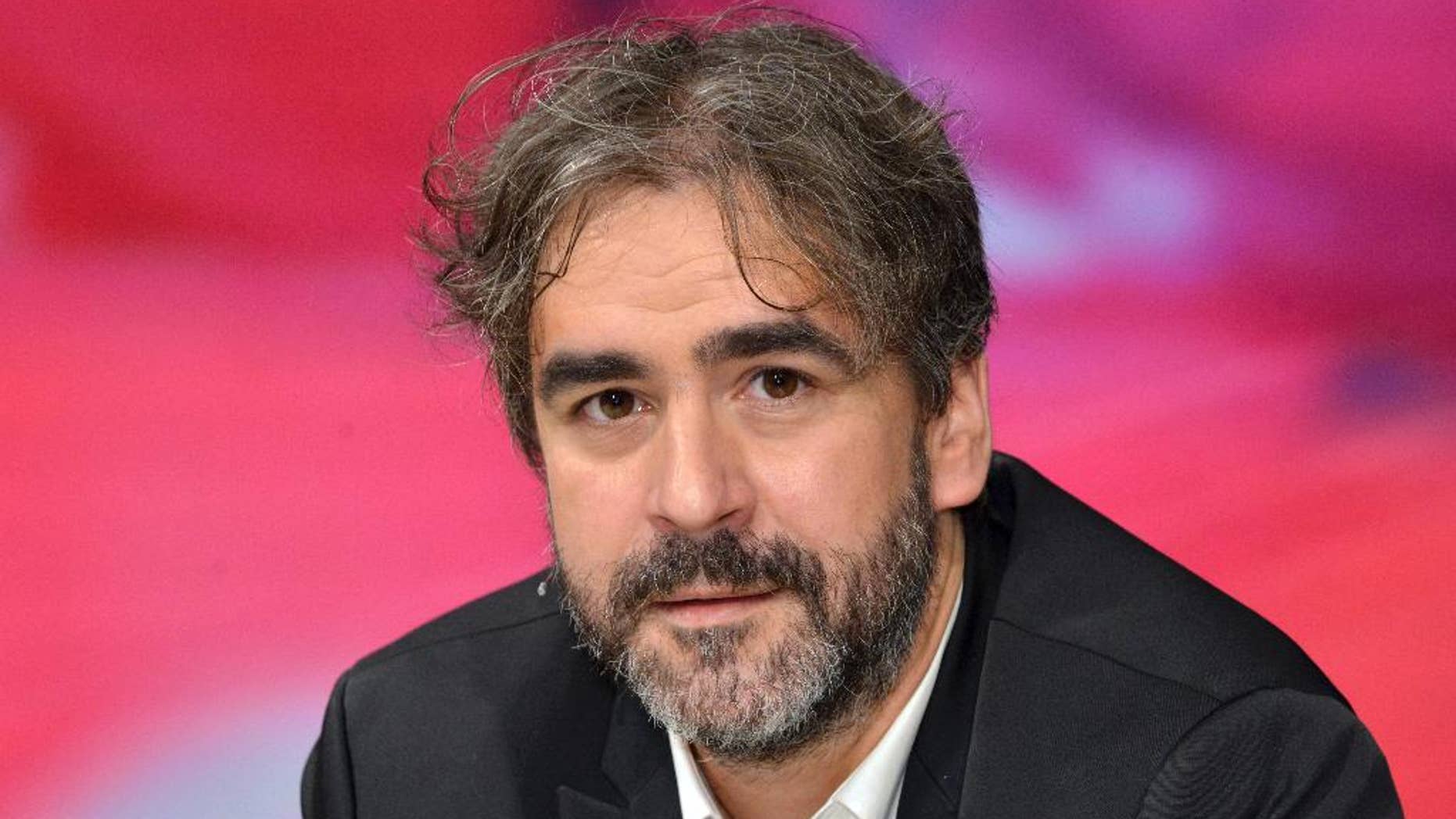 FILE - In this July 21, 2016 file photo German-Turkish journalist Deniz Yucel ia pictured during a talkshow in Berlin, Germany. Turkey told German Foreign Minister Sigmar Gabriel on Monday, April 3, 2017 that Germany could send diplomats to talk with Yucel on Tuesday, the ministry said. (Karlheinz Schindler/dpa via AP, file)