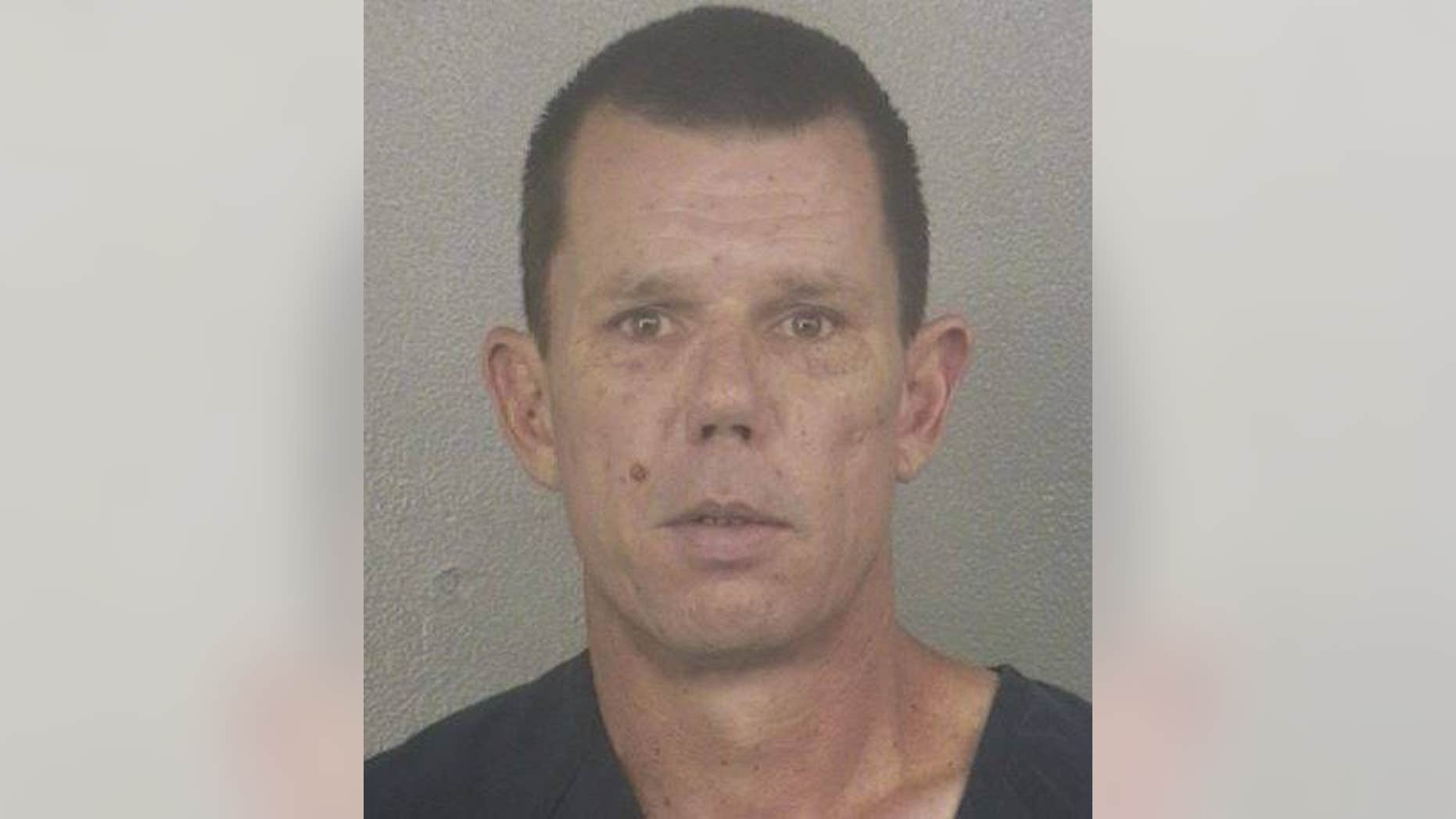 Police say Robert Nolan Young used a sob story about a missing cat to enter an elderly woman's home.