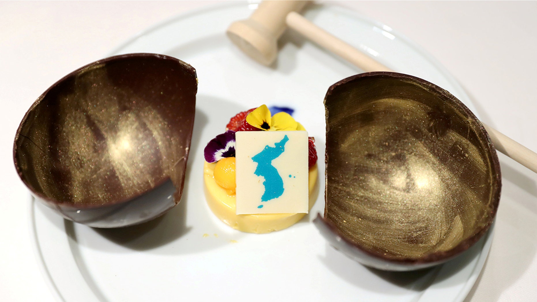Japan is angry over the “Spring of the People” mango mousse to be served at the North Korea summit.