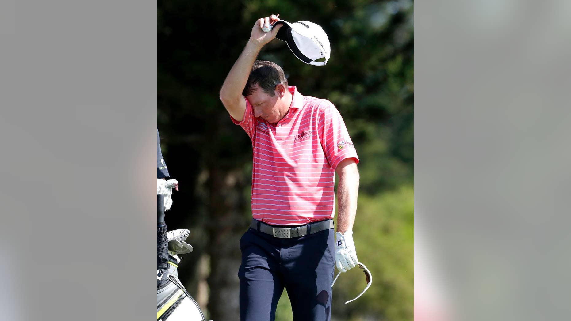 Jim Herman wipes his brow on the second tee during the first round of the Tournament of Champions golf event, Thursday, Jan. 5, 2017, at Kapalua Plantation Course in Kapalua, Hawaii. (AP Photo/Matt York)