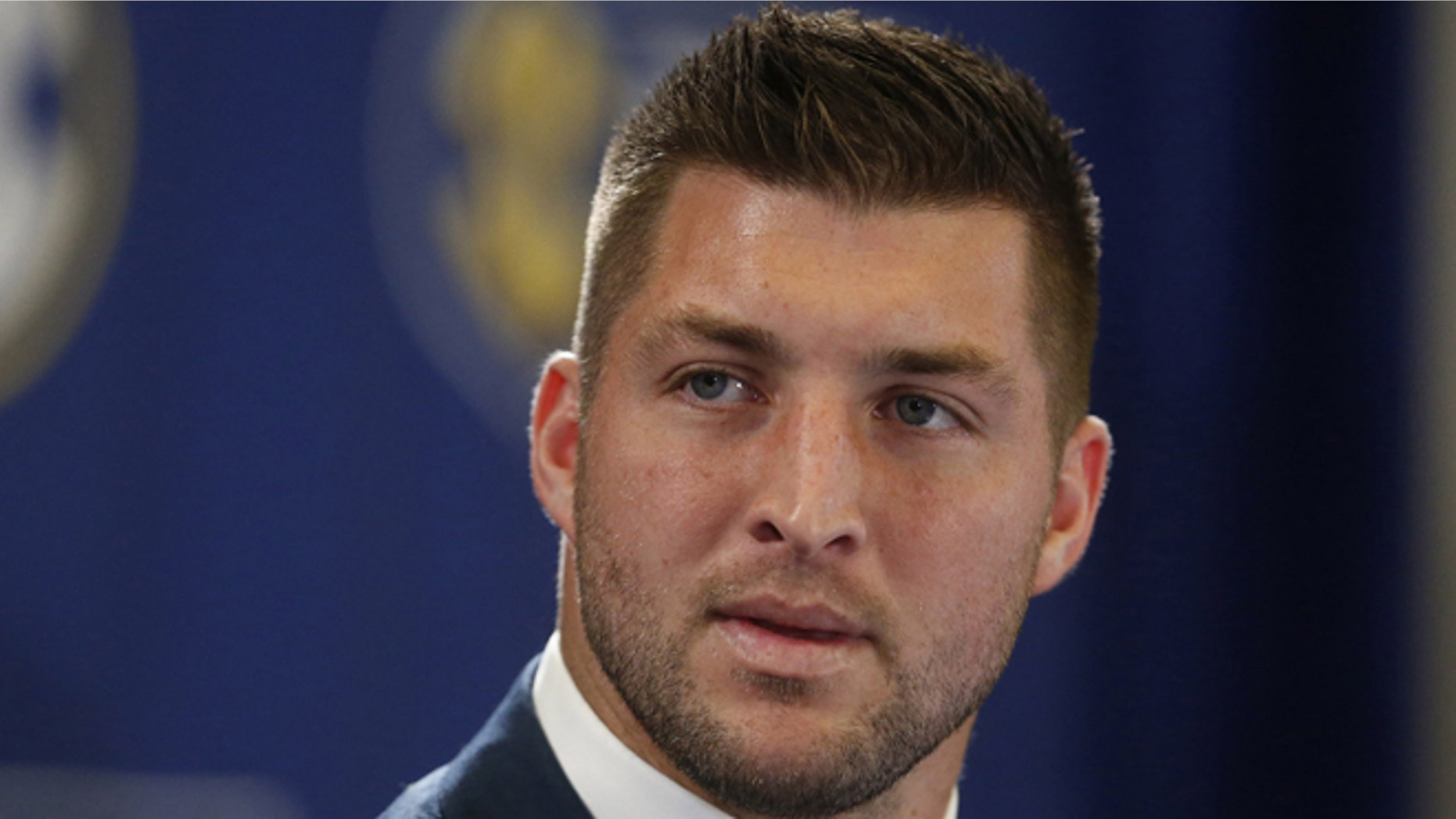 FILE - In this Dec. 5, 2014, file photo, Tim Tebow speaks during an SEC television broadcast in Atlanta. Tebow is expected to sign a one-year contract with the Philadelphia Eagles on Monday, April 20, 2015 according to three people familiar with the deal. (AP Photo/Brynn Anderson, File)
