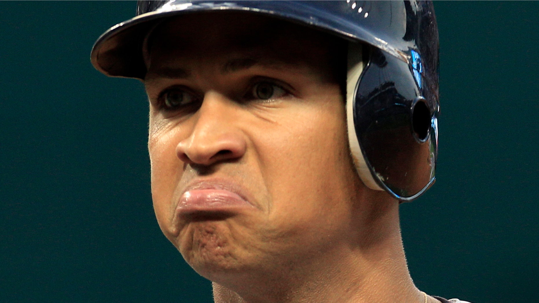 FILE - In this July 28, 2010 file photo, New York Yankees' Alex Rodriguez reacts after he popped out in the second inning in a baseball game against the Cleveland Indians in Cleveland. Injuries have kept him off the field for more than half the season and now A-Rod faces discipline from Major League Baseball in its drug investigation, possibly up to a lifetime ban. (AP Photo/Tony Dejak File)