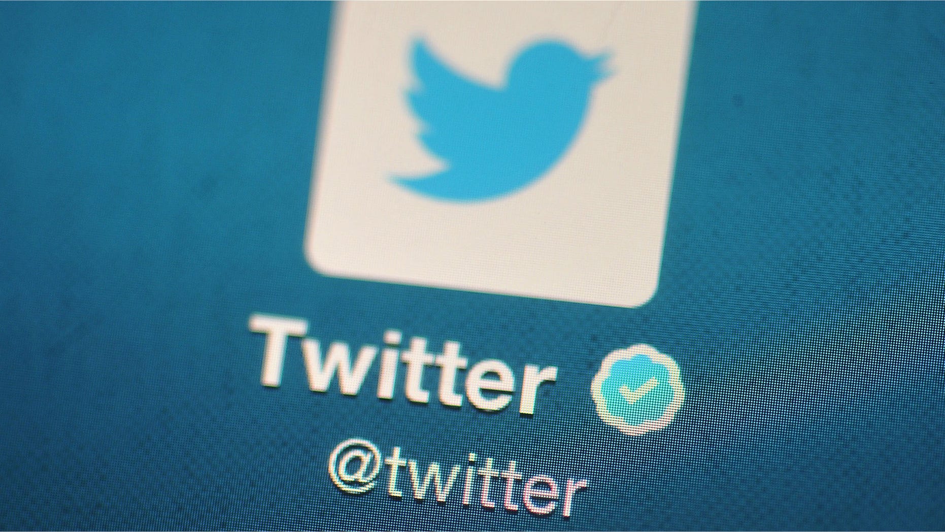 LONDON, ENGLAND - NOVEMBER 07: In this photo illustration, The Twitter logo is displayed on a mobile device as the company announced it's initial public offering and debut on the New York Stock Exchange on November 7, 2013 in London, England. Twitter went public on the NYSE opening at USD 26 per share, valuing the company's worth at an estimated USD 18 billion. (Photo by Bethany Clarke/Getty Images)
