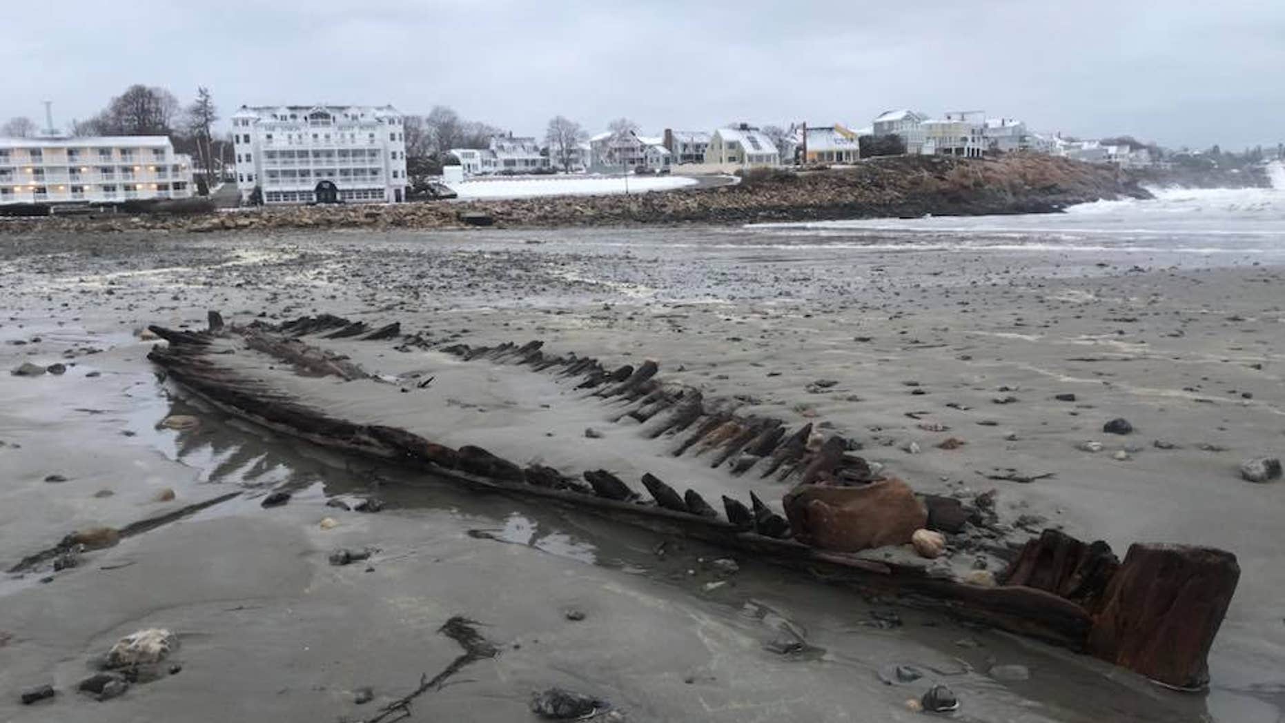 The shipwreck, believed to be more than 160 years old, resurfaced on Short Sands Beach Monday morning.