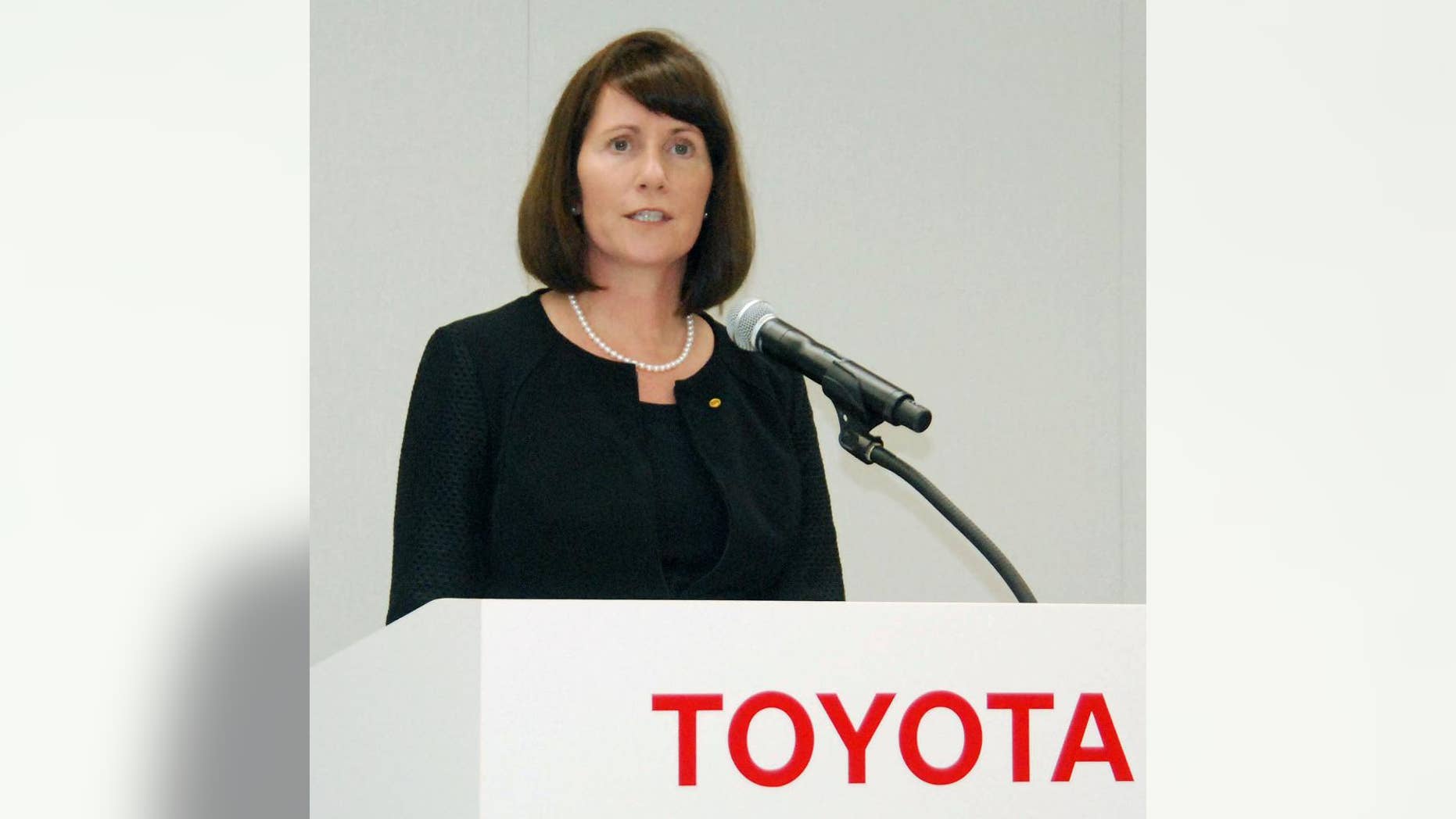 Julie Hamp, Toyota Motor Corp.'s new head of public relations, speaks during a press conference in Toyota, central Japan, Wednesday, June 17, 2015. Hamp was arrested Thursday, June 18, on suspicion of importing an illegal pain medicine into Japan, Tokyo police said. Hamp, an American, was appointed in April as Toyota's first female top executive. She had been moving her things to Japan from California, where she had been head of communications for Toyota's U.S. operations. (Kyodo News via AP) JAPAN OUT, CREDIT MANDATORY