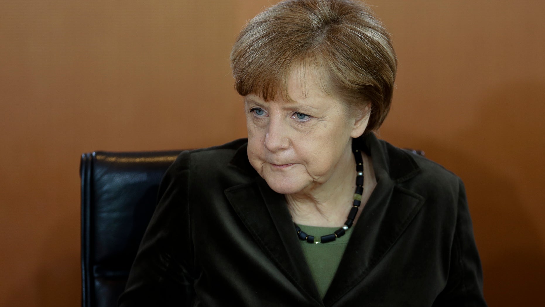 German Chancellor Angela Merkel attends the weekly cabinet meeting at the chancellery in Berlin, Germany, Wednesday, Feb. 26, 2014. (AP Photo/Markus Schreiber)