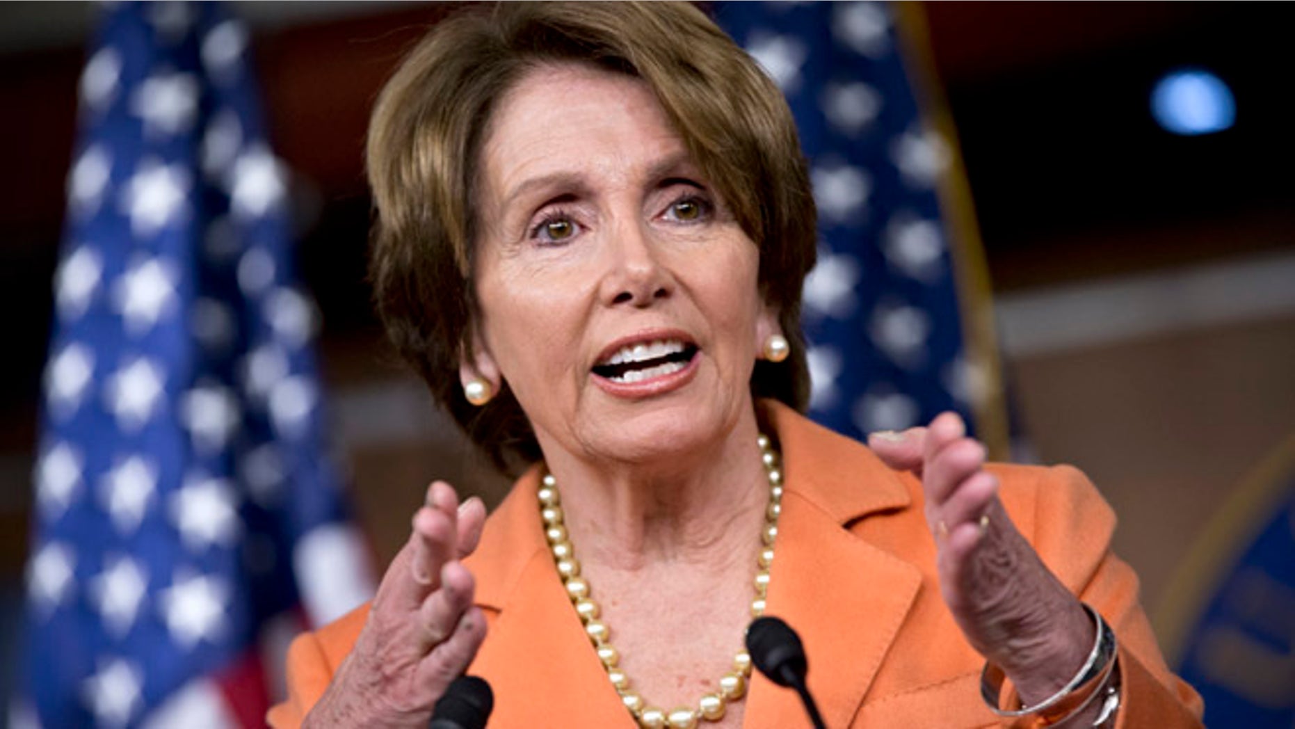 FILE: Dec. 13, 2012: House Minority Leader Nancy Pelosi gestures as she meets with reporters during a news conference on Capitol Hill, in Washington, D.C.