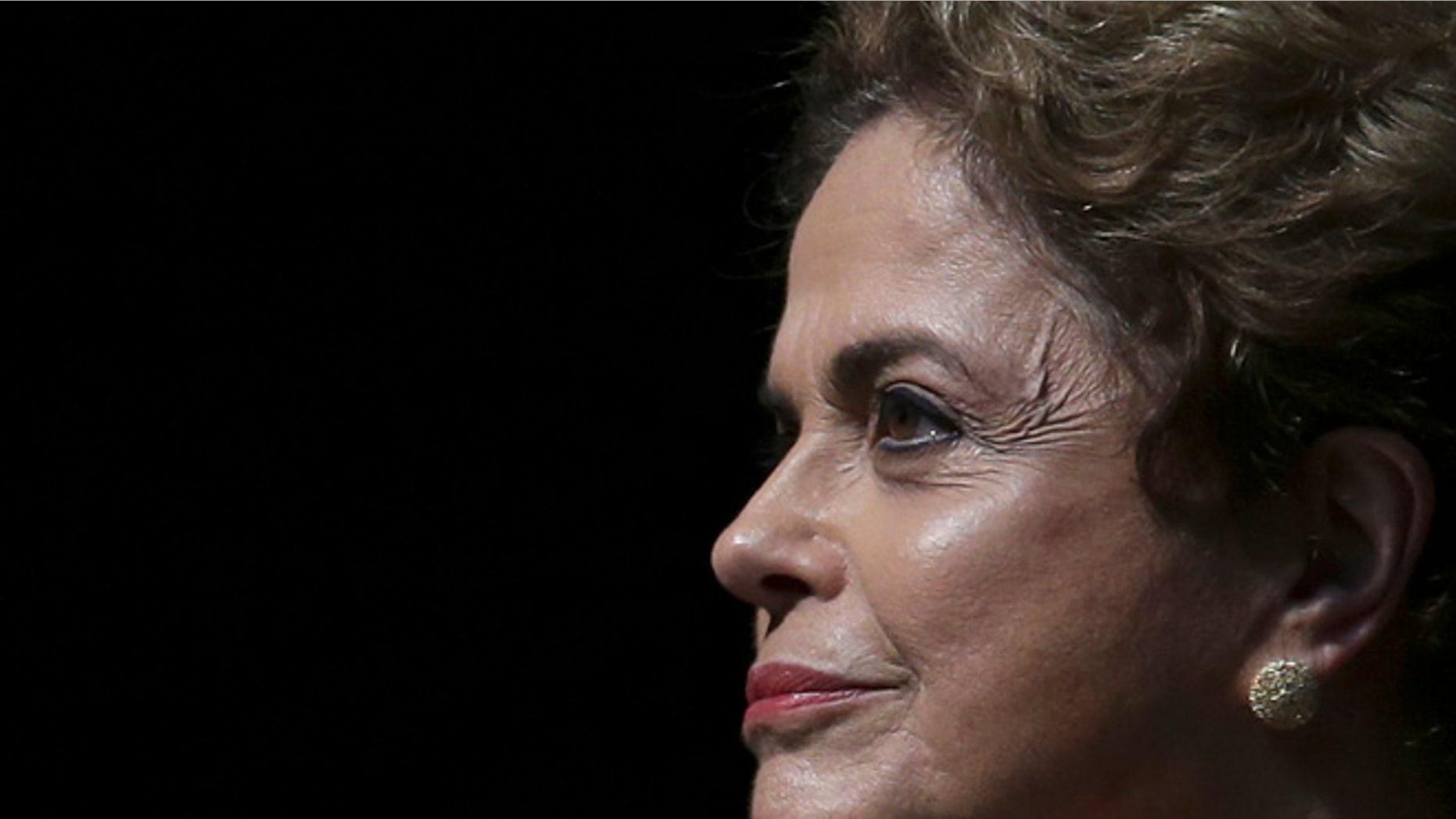 Brazil's President Dilma Rousseff attends the opening of the National Conference of Women, in Brasilia, Brazil, Tuesday, May 10, 2016. The impeachment proceedings against Rousseff took another hairpin turn Tuesday after the acting speaker of Congress' lower house Waldir Maranhao put the impeachment process back on track a day after he sparked chaos and sowed further discord among Brazil's fractious political class by annulling an April 17 vote by the Chamber of Deputies for impeachment. (AP Photo/Eraldo Peres)