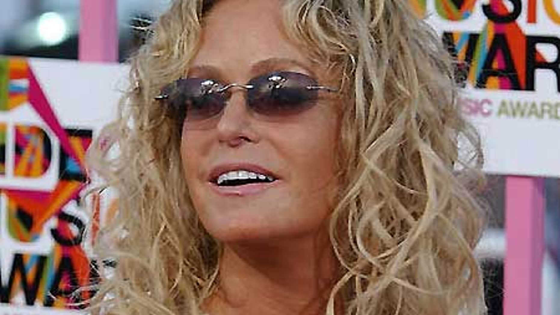 Farrah Fawcett.