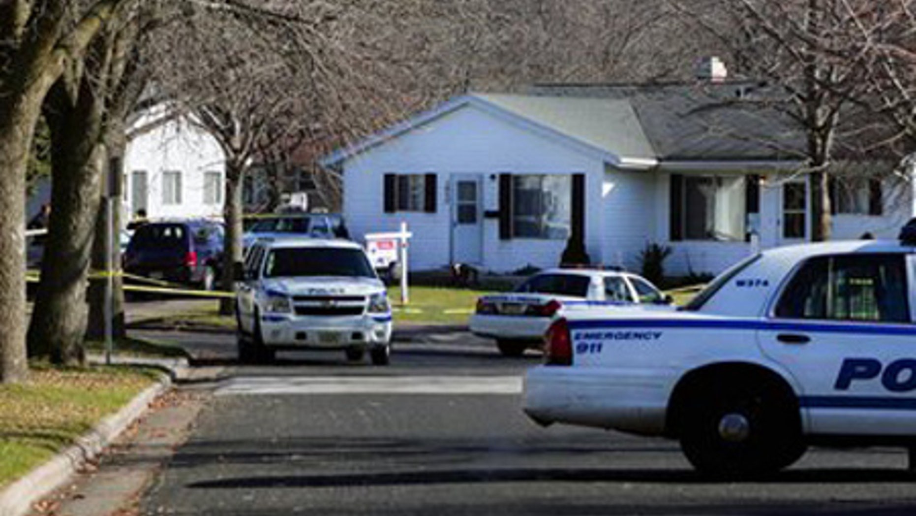 Nov. 28: Police block the intersection of Jacob's Way and Prairie Road in Madiison, Wis. for an investigation of a shooting that injured four.