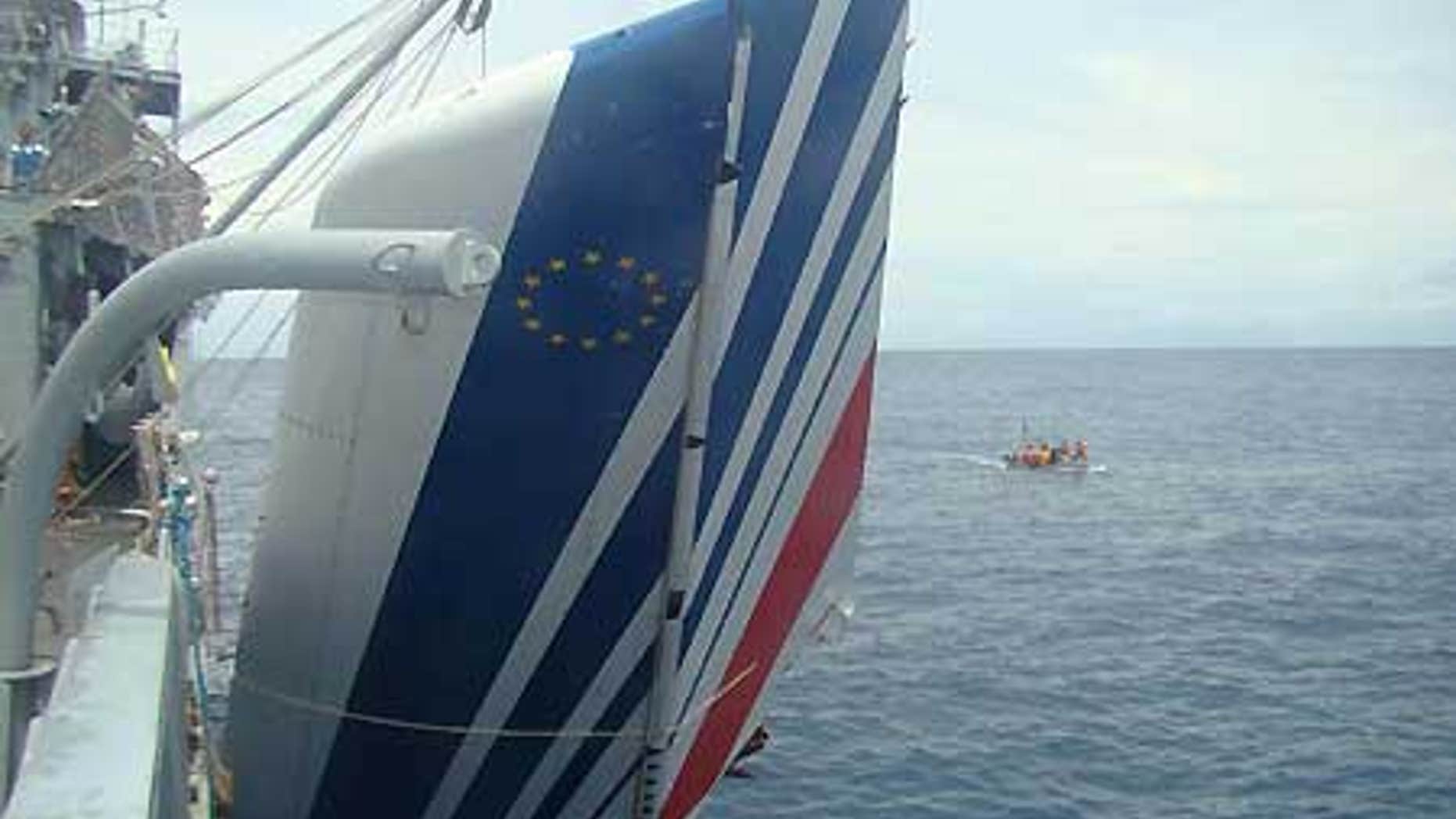 June 9: Brazil's Navy sailors recover debris of the missing Air France Flight 447 from the Atlantic Ocean.