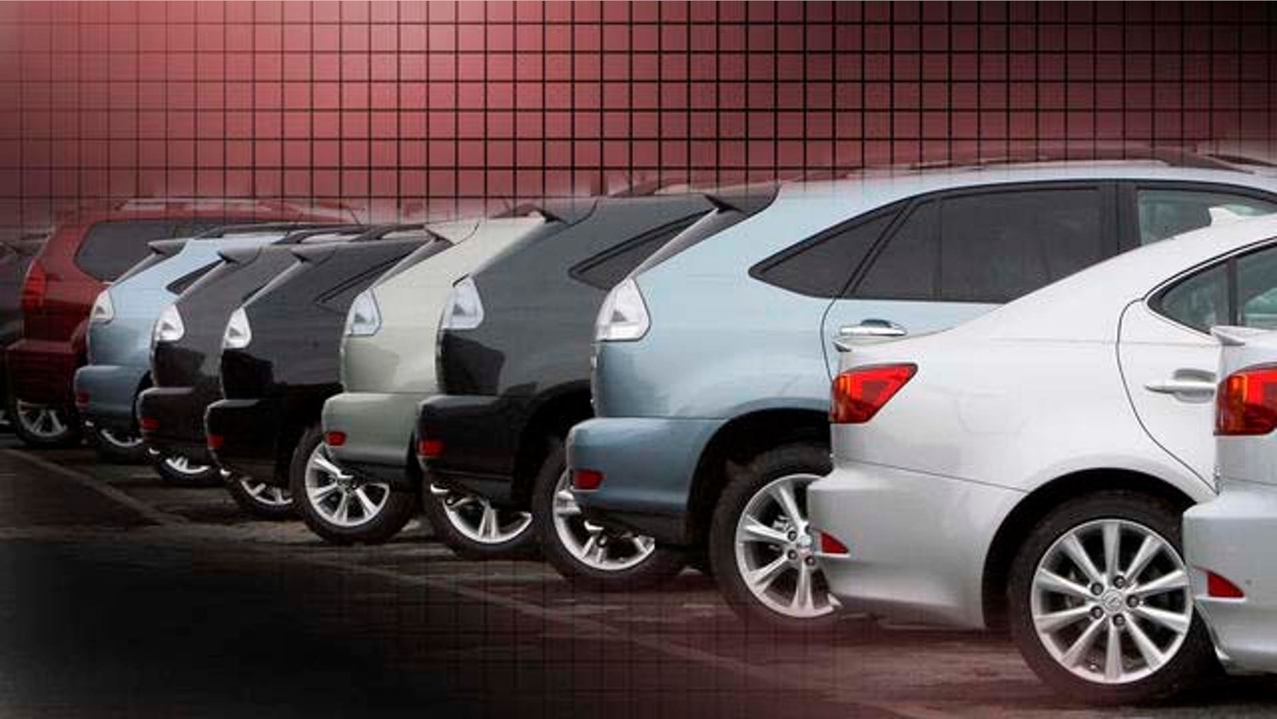 New cars are seen lined up at a dealership in Peabody, Mass. Monday, Jan. 5, 2009. Huge rebates and zero-percent loans couldn't trump economic uncertainty and the specter of bankruptcy as U.S. auto sales plunged 35 percent in December, capping a dismal 2008 that saw sales free-fall by more than 3 million vehicles from 2007. (AP Photo/Winslow Townson)