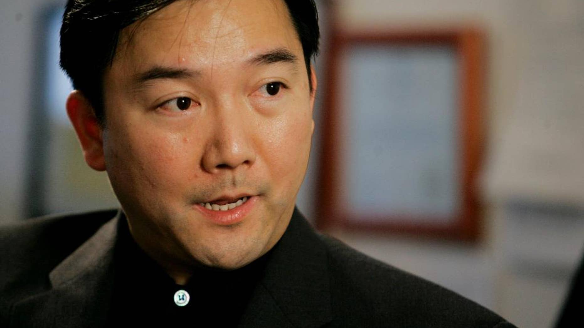 FILE - In this May 17, 2007 file photo, Chinese-Mexican businessman Zhenli Ye Gon is interviewed in his lawyer's office in Queens, N.Y. The businessman was extradited from the U.S. to Mexico, according to Deputy Attorney General Salvador Sandoval on Tuesday, Oct. 18, 2016. Ye Gon had been jailed in the U.S. since July 2007, when authorities seized more than $205 million from his Mexico City mansion, one of the largest drug-related cash seizures ever. (AP Photo/Richard Drew, File)