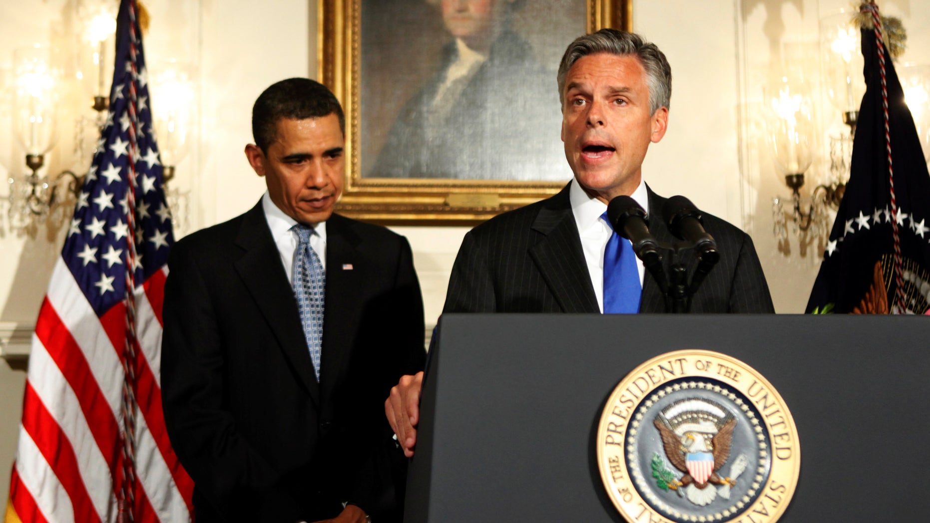 In this May 16, 2009, file photo Utah Governor Jon Huntsman speaks in the Diplomatic Room of the White House in Washington after President Barack Obama, left, announced his nomination to U.S. ambassador to China. (AP)
