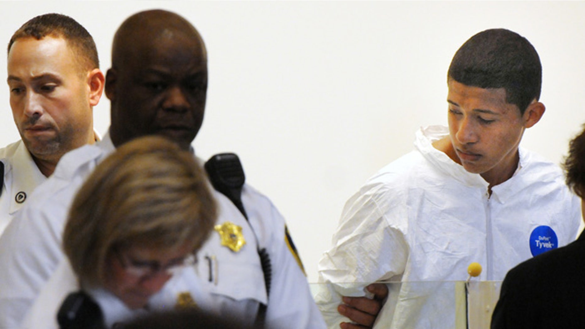 Oct. 23, 2013: Philip Chism, 14, stands during his arraignment for the death of Danvers High School teacher Colleen Ritzer in Salem District Court in Salem, Mass. Chism has been ordered held without bail.