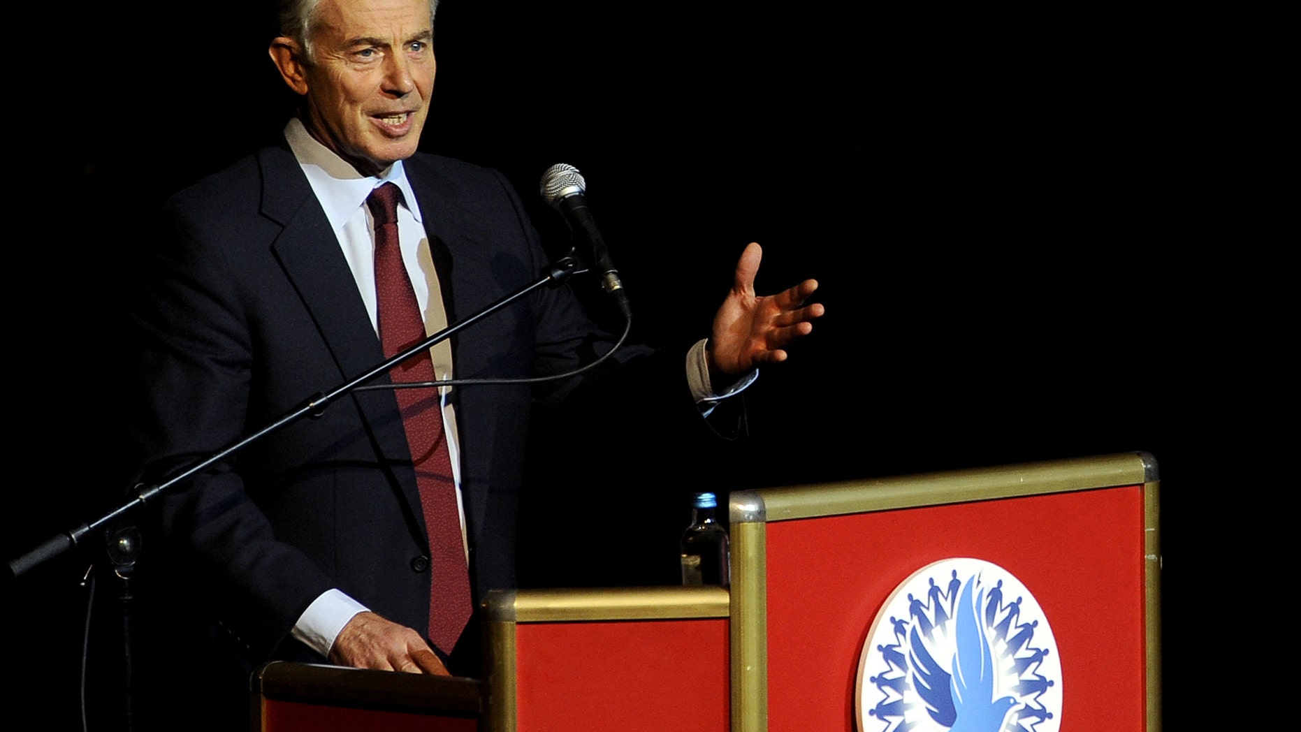 Former British Prime Minister Tony Blair speaks at the Balkan Peace Festival, organized by the Indian "Sahara Group" in honor of the International Day of Non-Violence, in Skopje, Macedonia, Wednesday, Oct. 2, 2013. (AP Photo/Boris Grdanoski)