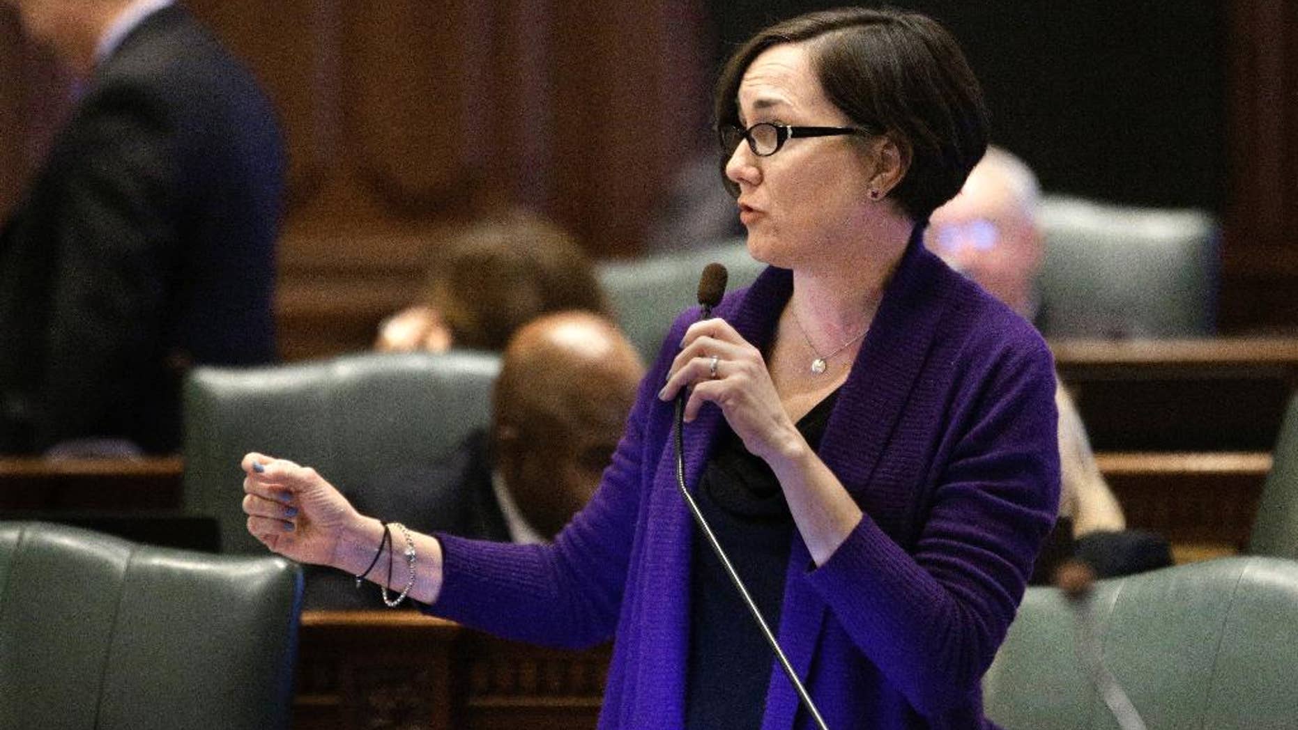 FILE - In this April 12, 2016 file photo, Illinois Rep. Kelly Cassidy, D-Chicago, speaks at the Illinois State Capitol in Springfield, Il. A group of pastors are suing Illinois over law barring therapists from trying to change a minor's sexual orientation. The lawsuit filed in federal court Thursday Aug, 11, 2016 seeks to exclude clergy from the ban that took effect this year. Cassidy, who sponsored the bill, said she's met with people who have gone through conversion therapy and they tell stories of feeling suicidal, humiliated and alienated from their families. (AP Photo/Seth Perlman File)