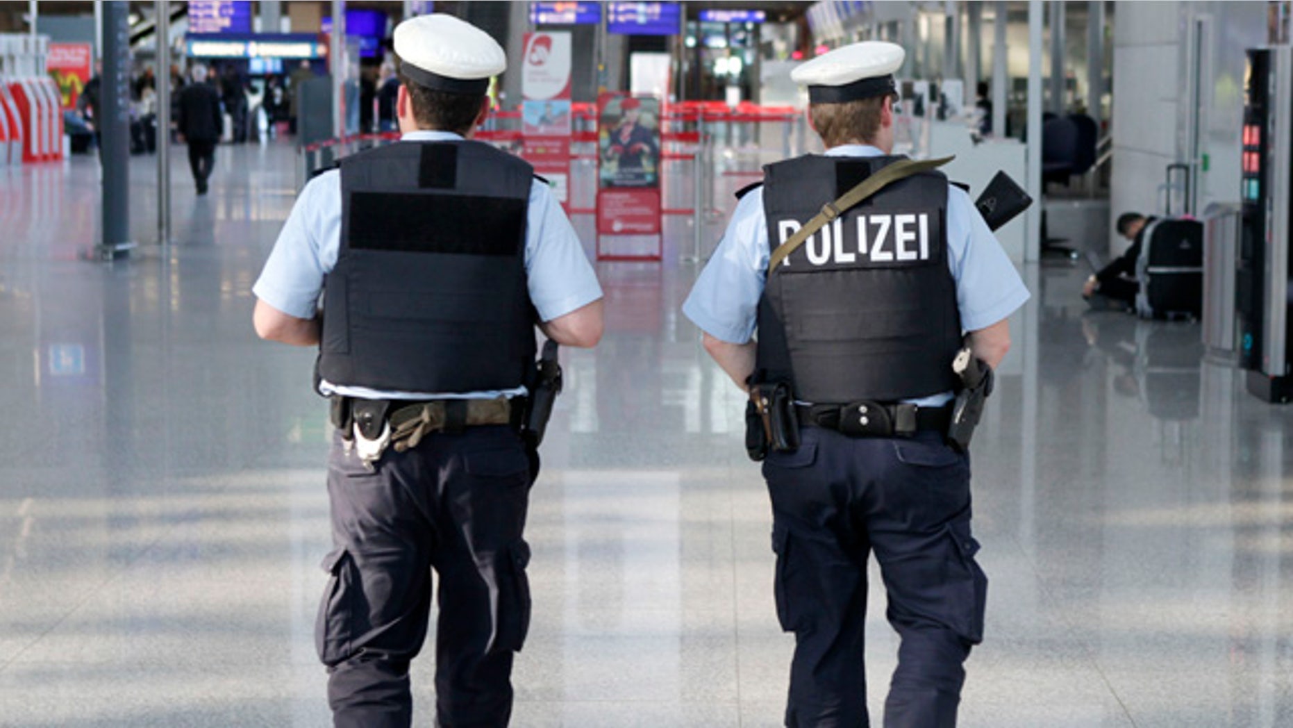 Feb. 3: Police patrol Germany's Frankfurt Airport a day after Wednesday's attack on a busload of U.S. airmen that killed two and wounded two others. Security experts told FoxNews.com that the attack -- and another in Moscow in January -- show glaring security gaps at airport terminals in the U.S. and around the world. (AP)