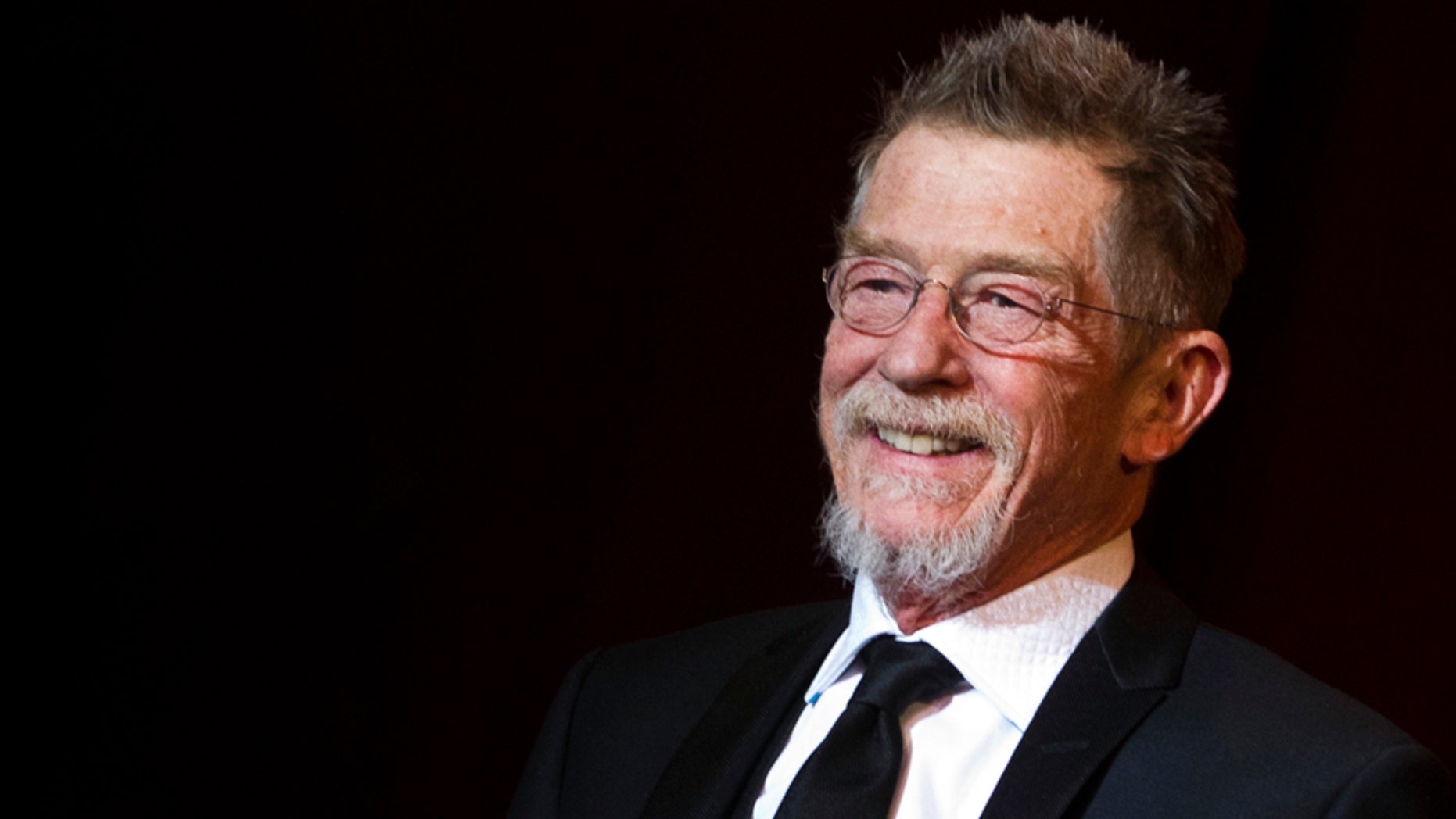 British actor John Hurt arrives on stage as a patron of the Shooting Star award, a prize for the ten most promising young European actors, at the 62th Berlinale International Film Festival in Berlin February 13, 2012. REUTERS/Thomas Peter (GERMANY - Tags: ENTERTAINMENT) - RTR2XSV1